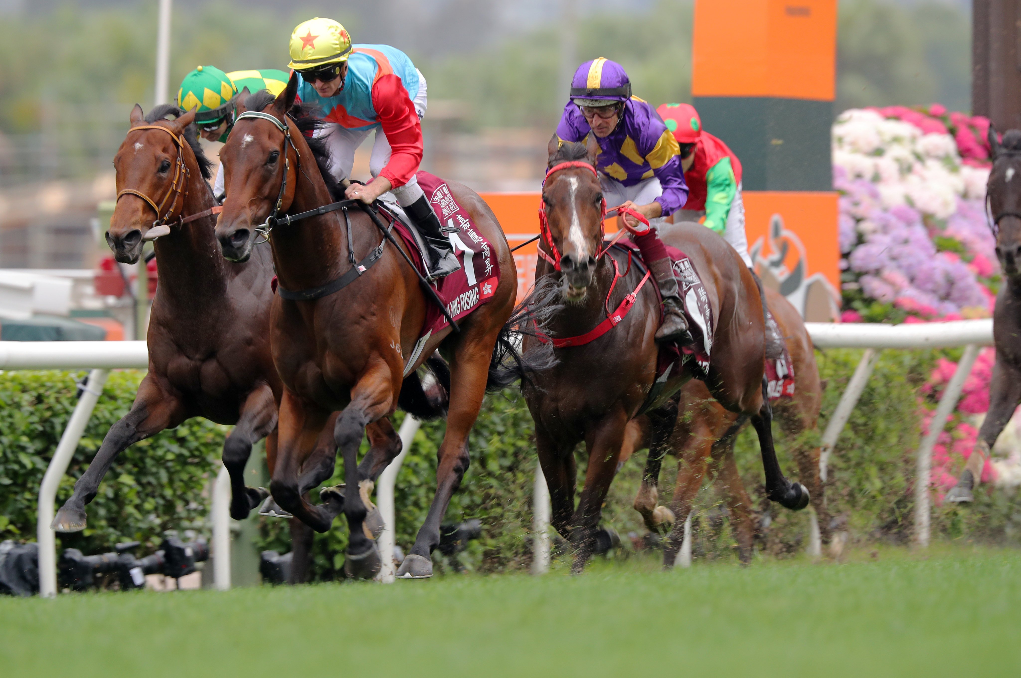 Helios Express (purple and gold silks) finishes close behind Ka Ying Rising and Satono Reve in the Group One Chairman’s Sprint Prize. Photos: Kenneth Chan