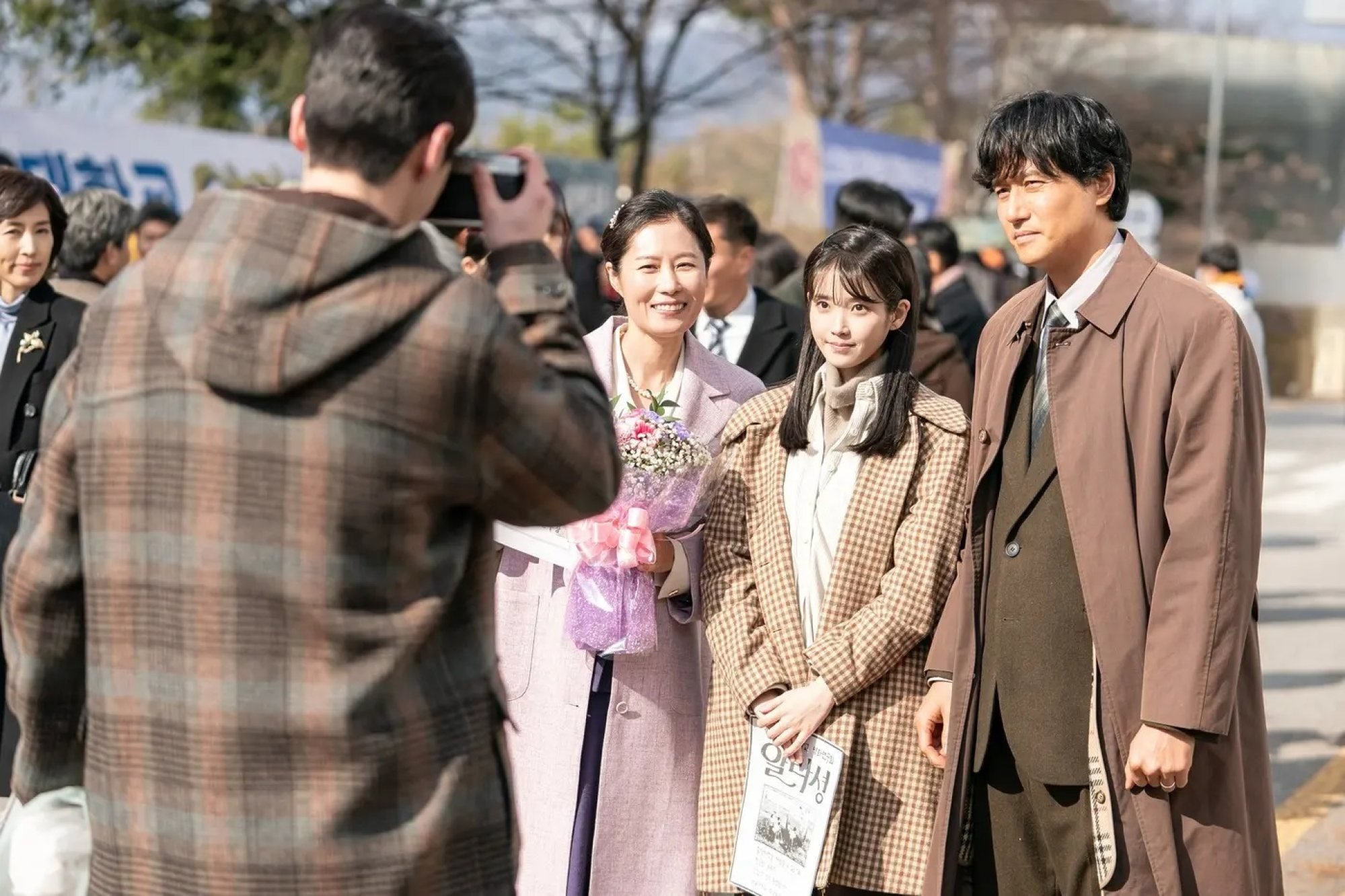 (From left) Moon So-ri, IU and Park Hae-joon in a still from “When Life Gives You Tangerines”. Photo: Netflix (From left) Moon So-ri, IU and Park Hae-joon in a still from “When Life Gives You Tangerines”. Photo: Netflix
