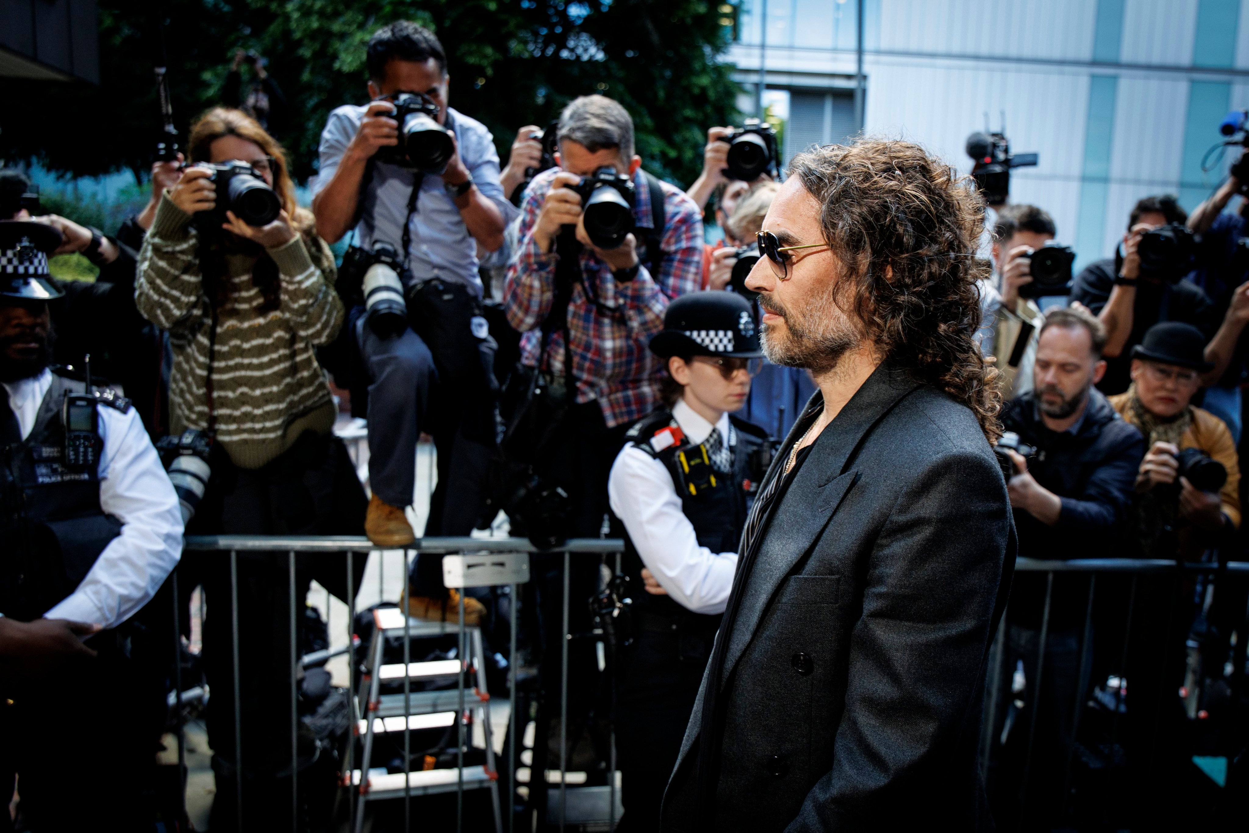 Russell Brand arrives at Southwark Crown Court to enter his plea on charges of rape and sexual assault in London on Friday. Photo: EPA-EFE