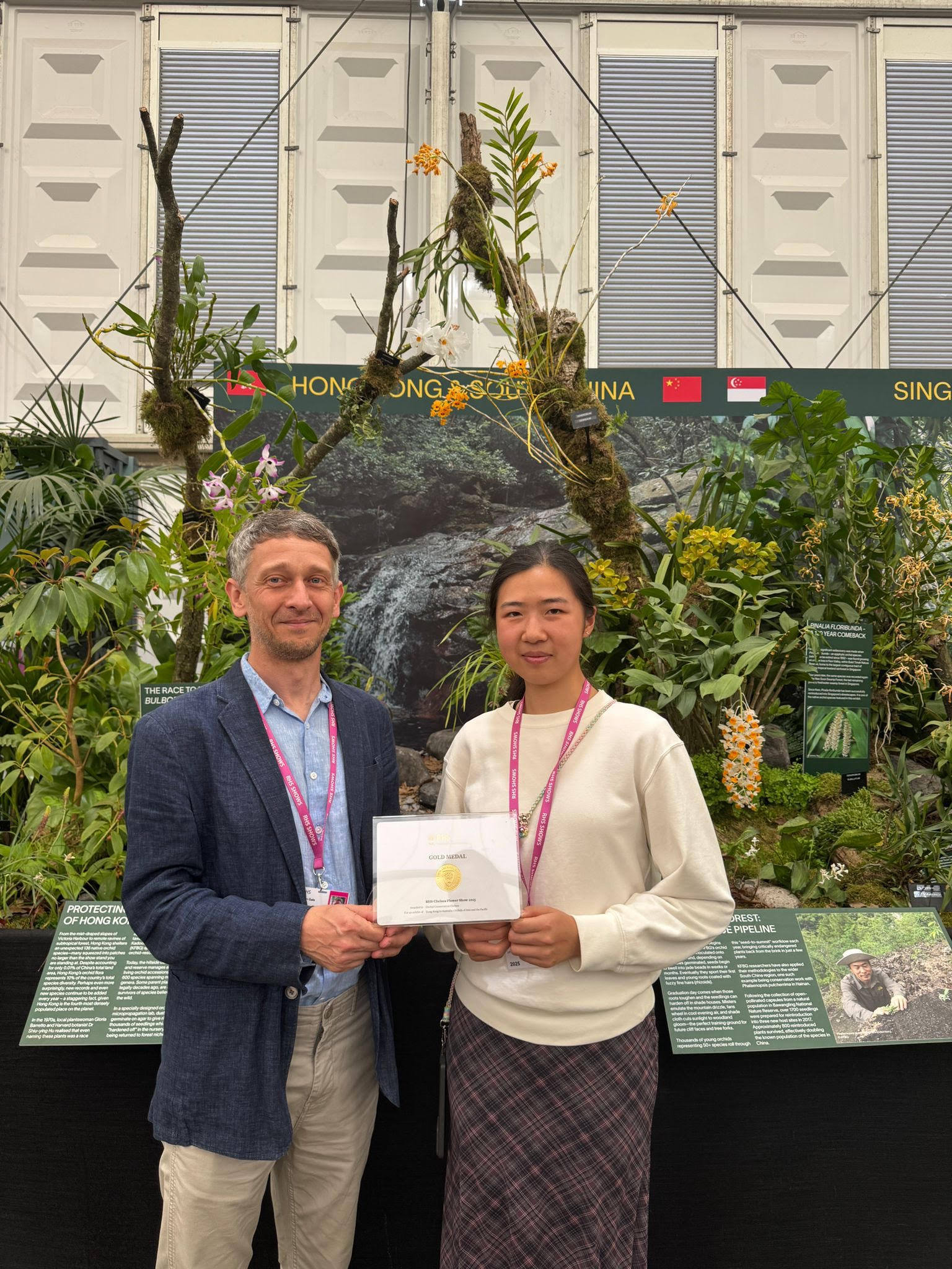 Kadoorie Farm’s Stephan Gale and Candy Ip with the prized gold medal from the Chelsea Flower Show. Photo: Cliff Buddle