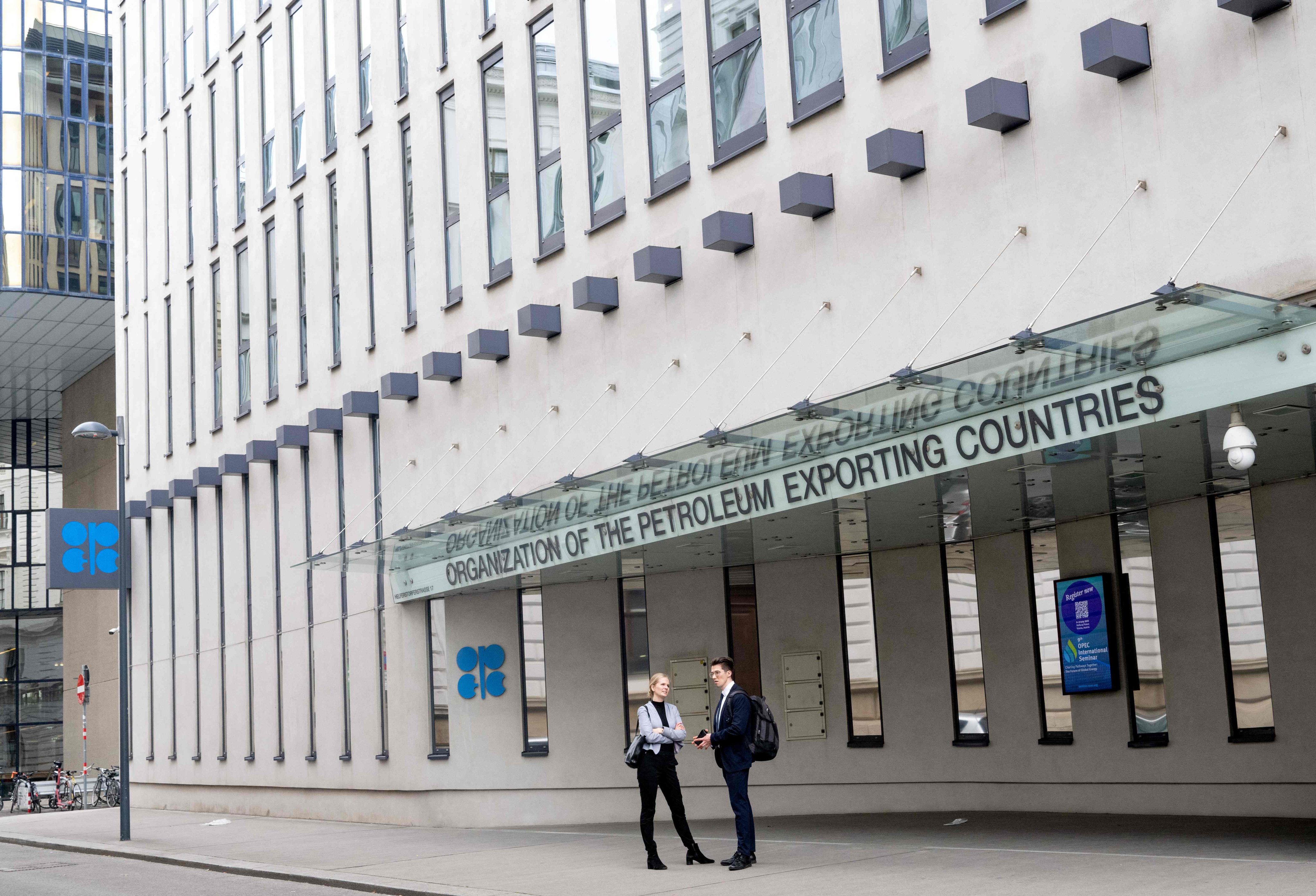 People stand outside the building headquarters of Opec in Vienna, Austria on May 28. Photo: AFP