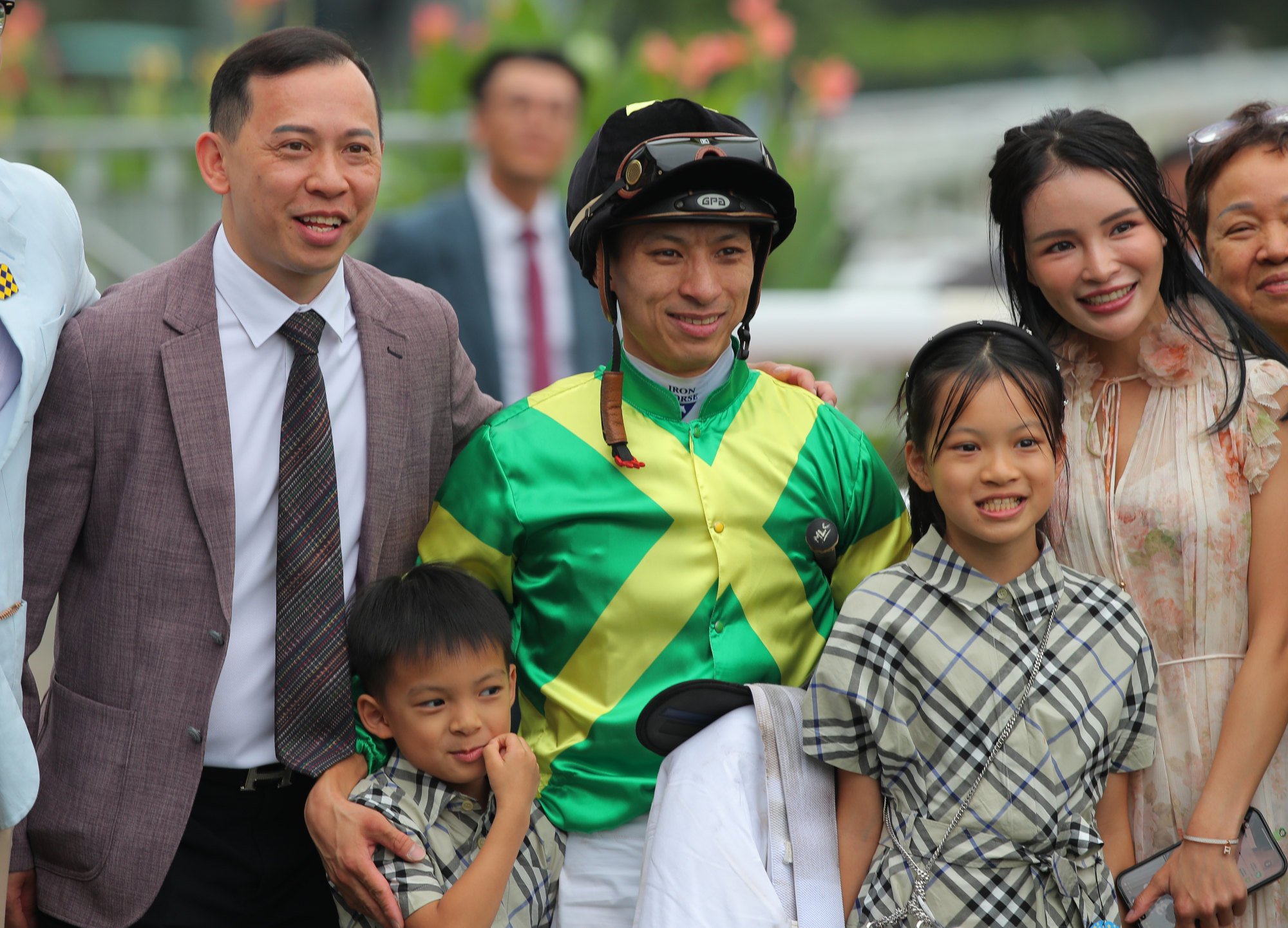 Matthew Chadwick poses with trainer Cody Mo and his family in the winners’ enclosure. Matthew Chadwick poses with trainer Cody Mo and his family in the winners’ enclosure.