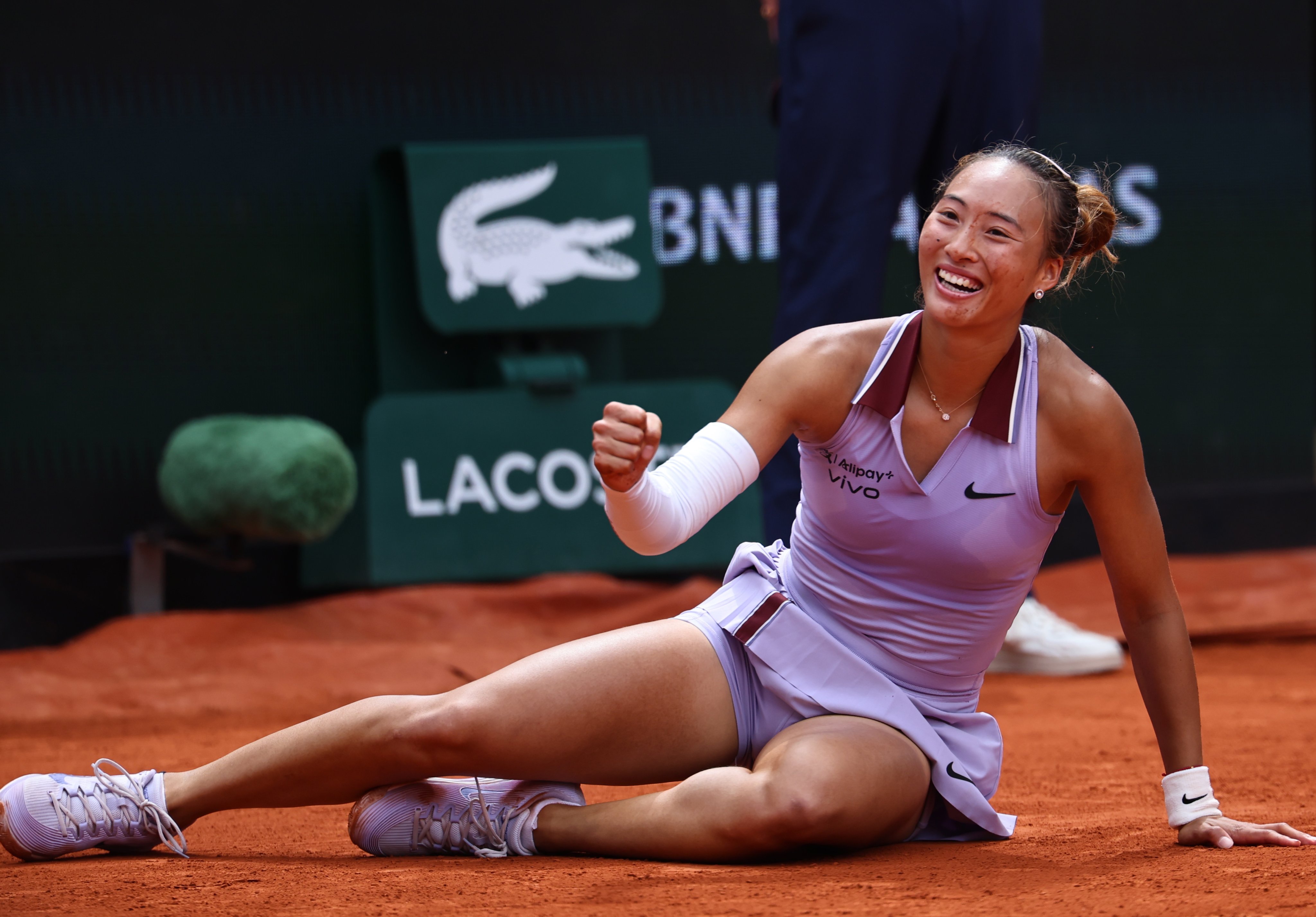 A smiling Zheng Qinwen elebrates beating Liudmila Samsonova in the fourth round of the women’s singles at the French Open. Photo: EPA-EFE
