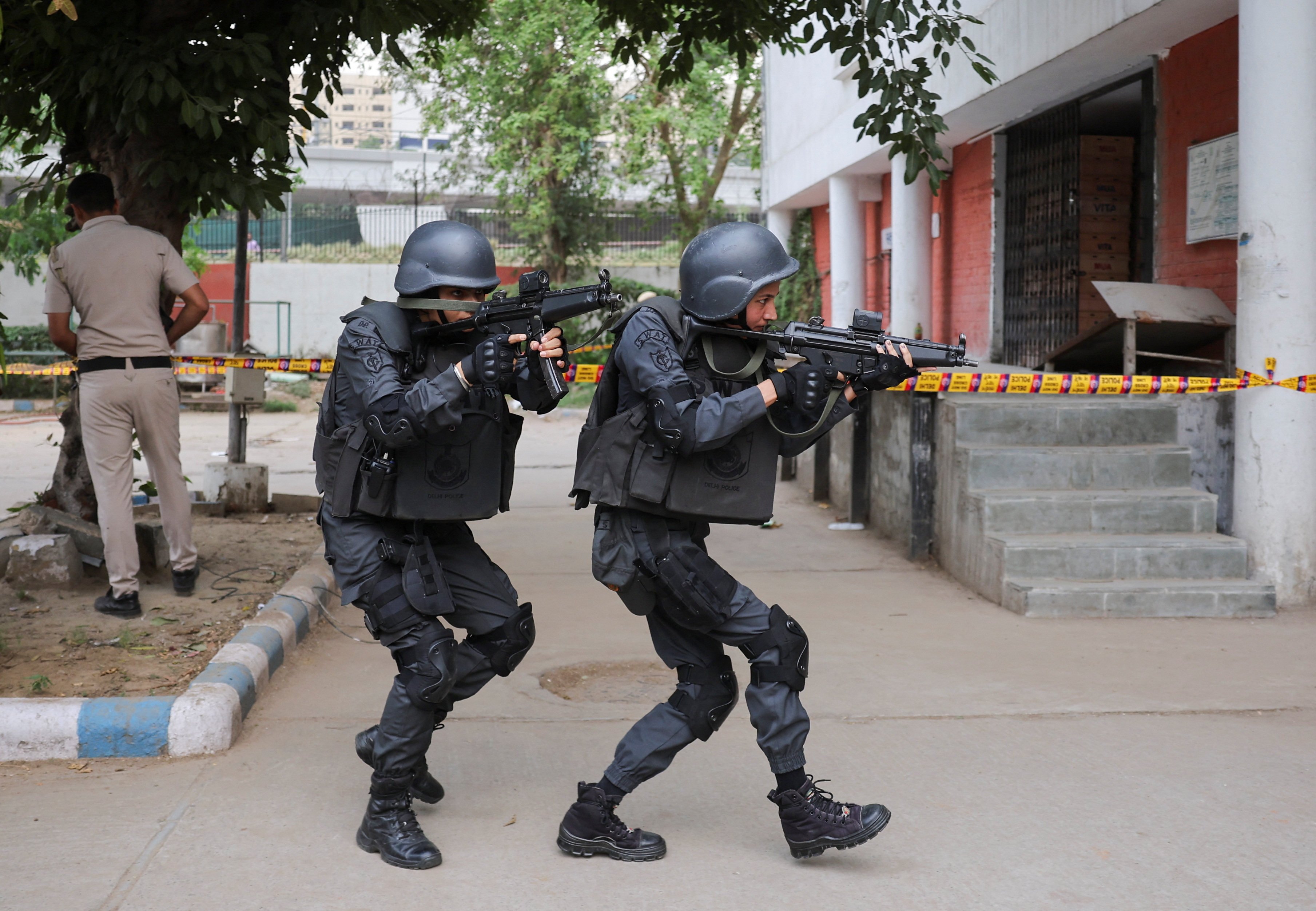 Members of the Delhi Police SWAT team participate in a mock drill exercise on May 16. Photo: Reuters