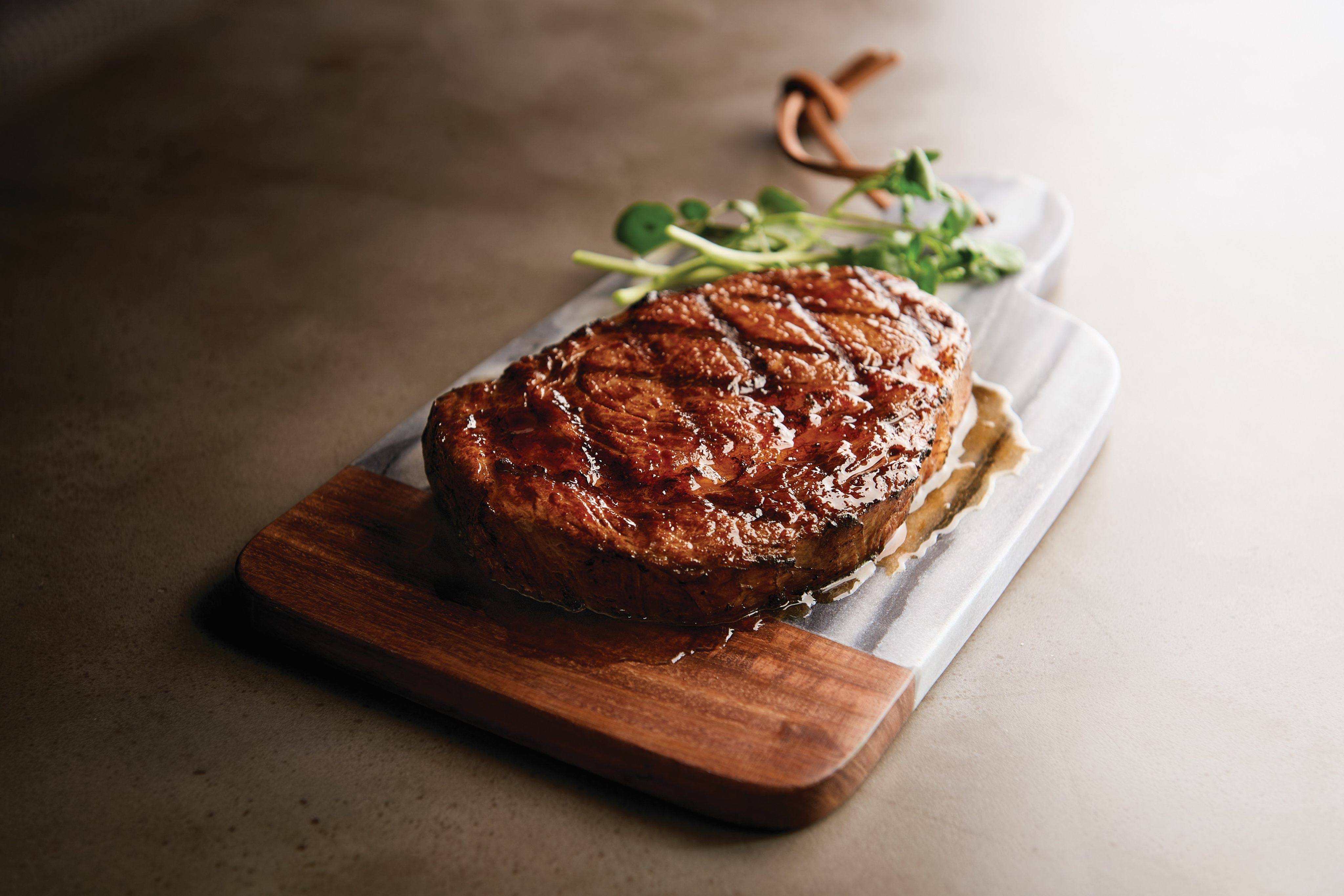 Morton’s The Steakhouse is offering two special steaks for Father’s Day 2025 in Hong Kong, including this 16oz dry-aged rib-eye, served with thick-cut onion rings and black truffle aioli. Photo: Morton’s The Steakhouse