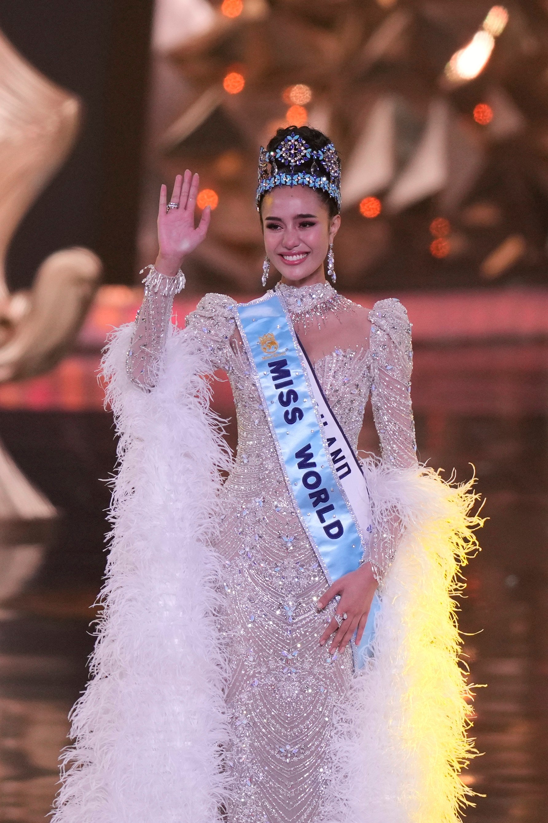 Suchata Chuangsri of Thailand waves after she was crowned Miss World 2025 in Hyderabad, India, on Saturday. Photo: AP