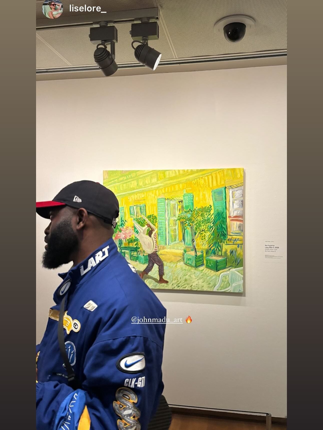 Nigerian artist John Madu stands in front of one of his paintings at the Van Gogh Museum in Amsterdam, where his solo exhibition “Paint Your Path” opened on May 30. Photo: Instagram/johnmadu_art