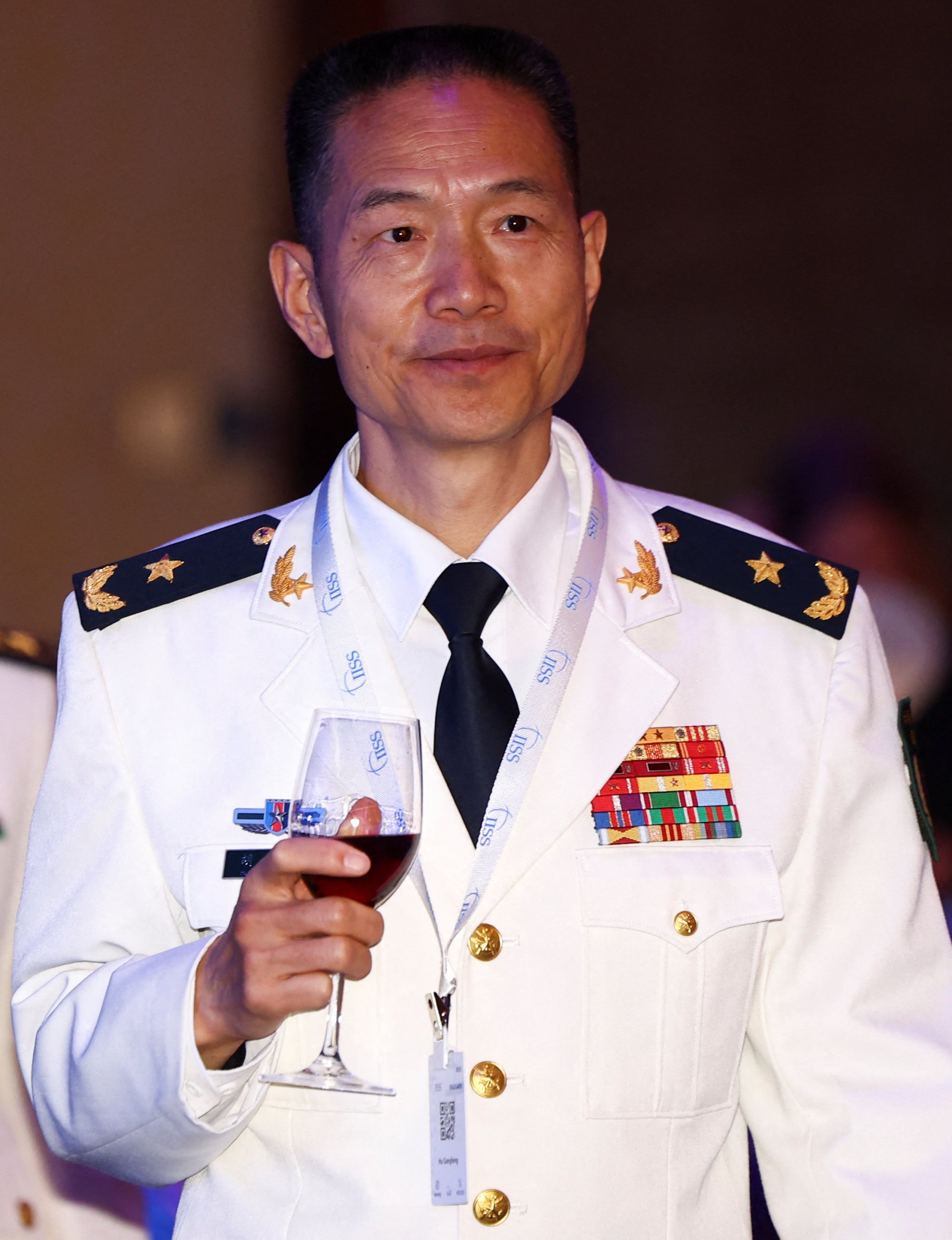 China’s Rear Admiral Hu Gangfeng at the Shangri-La Dialogue security summit in Singapore on Friday. Photo: Reuters China’s Rear Admiral Hu Gangfeng at the Shangri-La Dialogue security summit in Singapore on Friday. Photo: Reuters