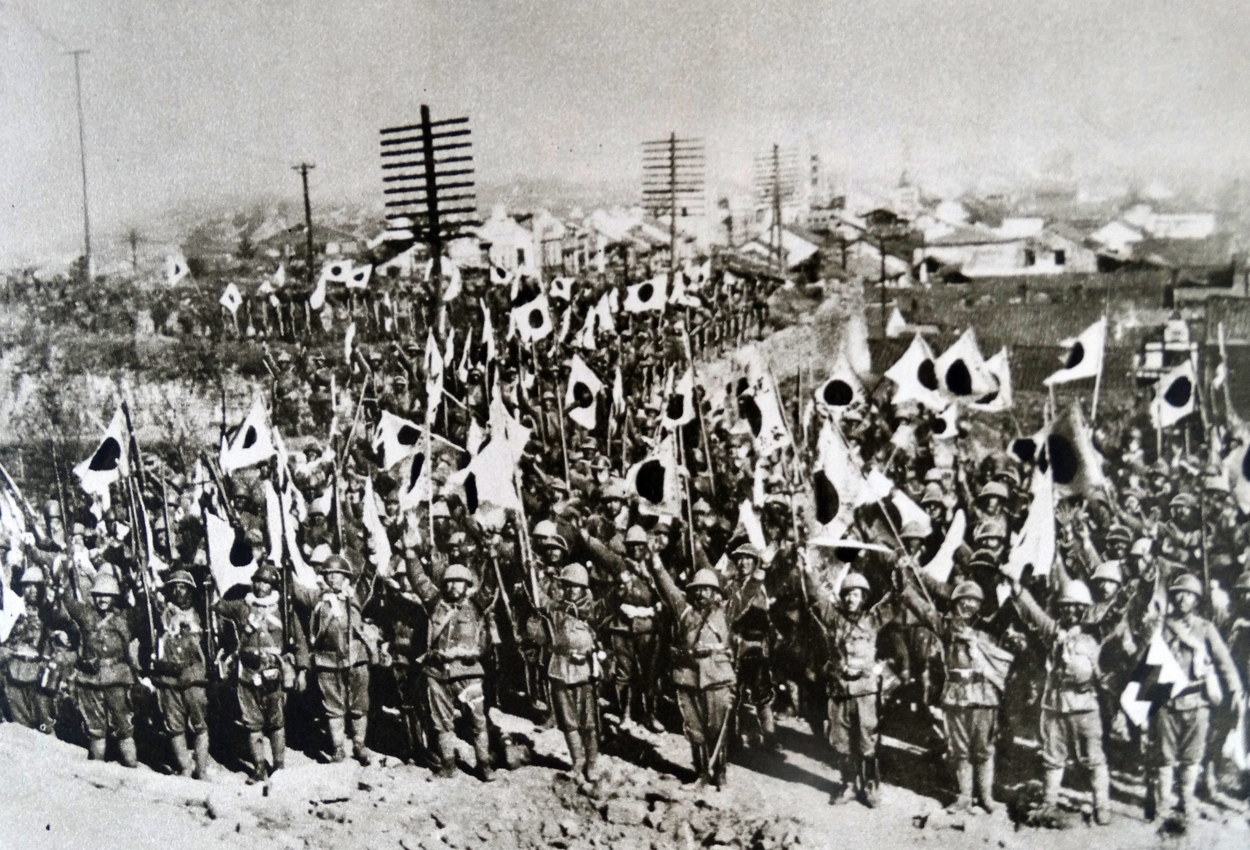 Japanese troops in Nanking, now known as Nanjing, after conquering the city in 1937. Photo: Universal Images Group via Getty Images