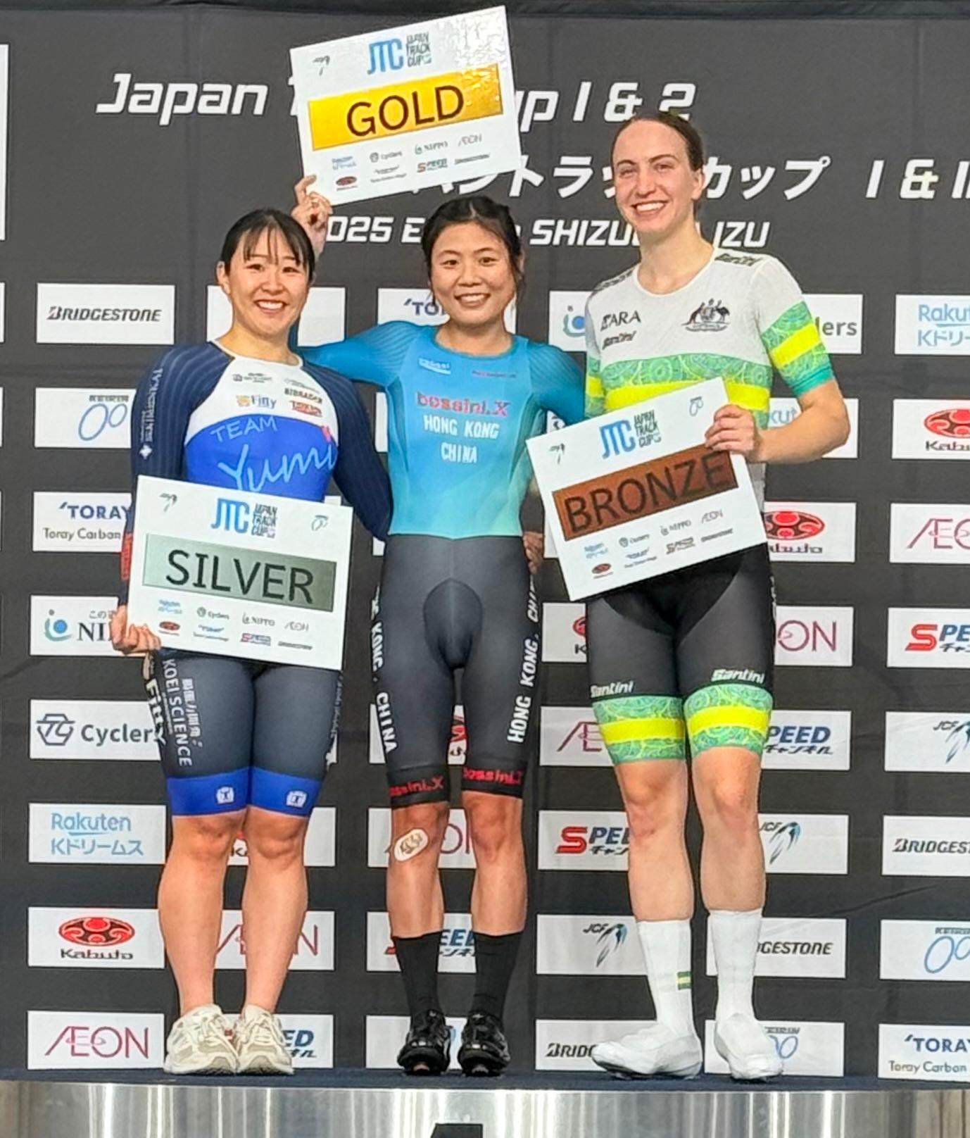 Chloe Leung toasts her golden moment with Yumi Kajihara and bronze medallist Sophie Edwards of Australia. Photo: Handout