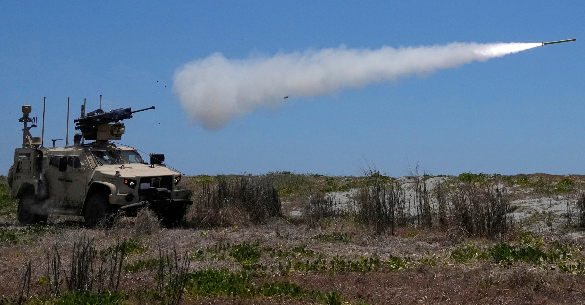 A US missile system fires a projectile during a live-fire joint drill in the Philippines in April. Photo: AP A US missile system fires a projectile during a live-fire joint drill in the Philippines in April. Photo: AP