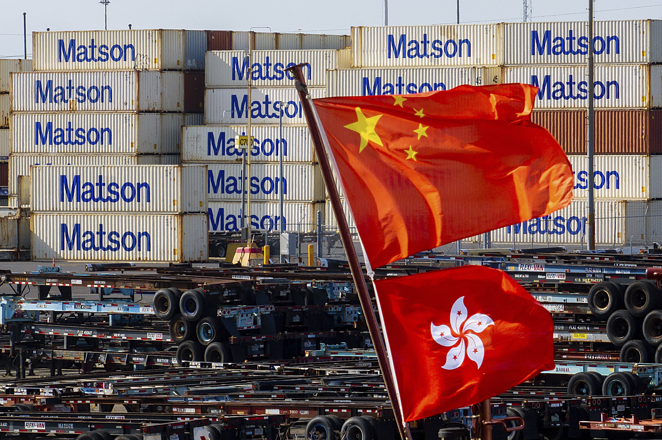 Flags representing China and Hong Kong fly from a ship at the Port of Oakland on Tuesday, April 15, 2025, in Oakland, California, US. Photo: AP