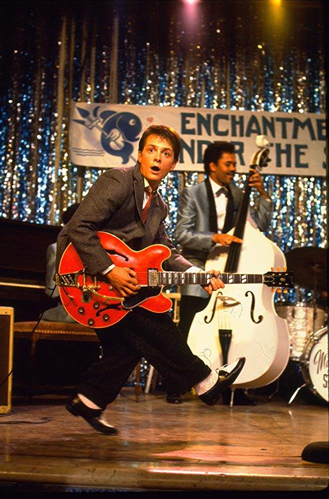 Marty McFly (Michael J. Fox) plays a Cherry Red Gibson ES-345 in the high-school dance scene from 1985’s Back to the Future. A search is on for the guitar as the film’s 40th anniversary nears. Photo: Facebook/Do You Remember?