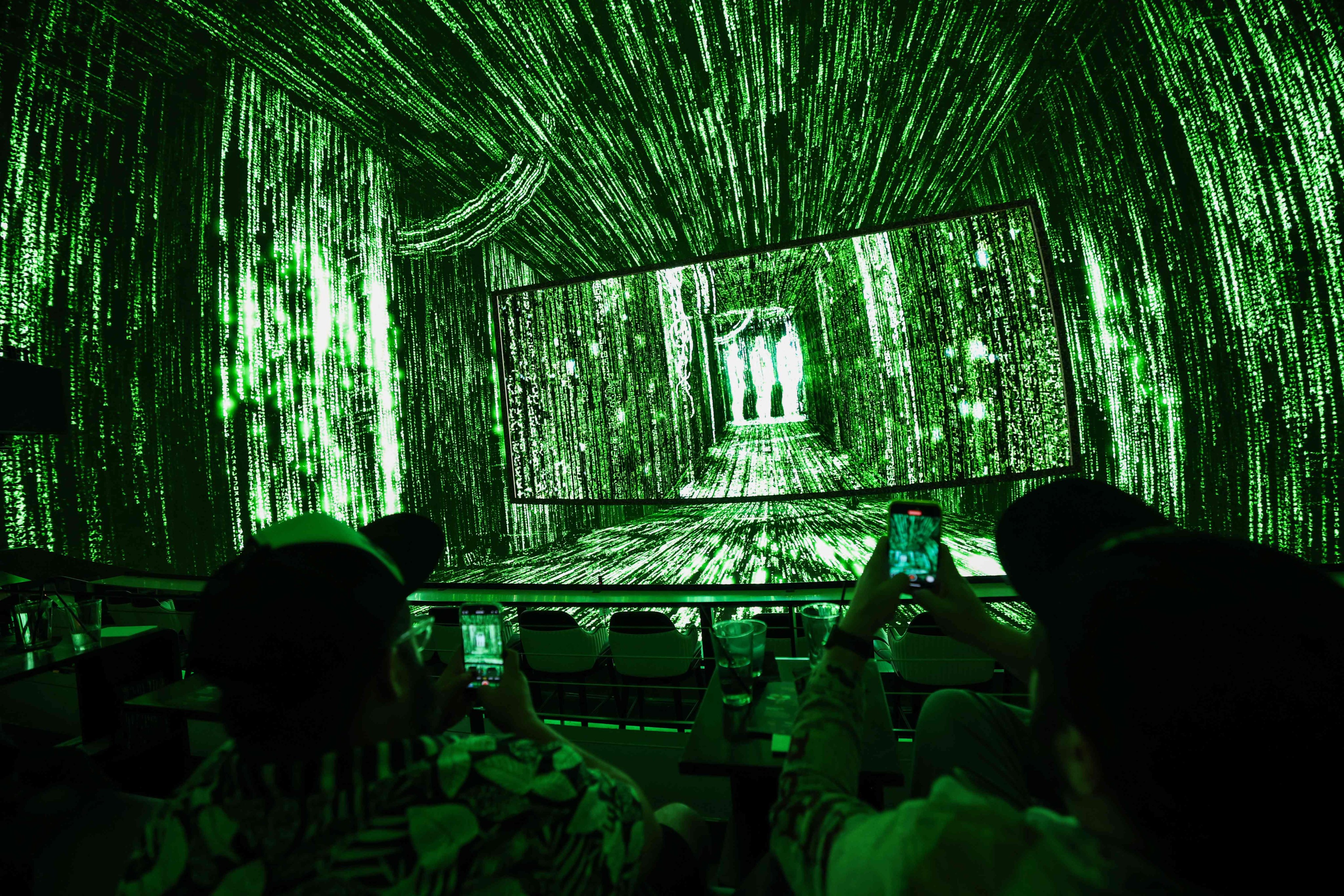 Attendees a an immersive The Matrix screening in Los Angeles. Photo: AFP