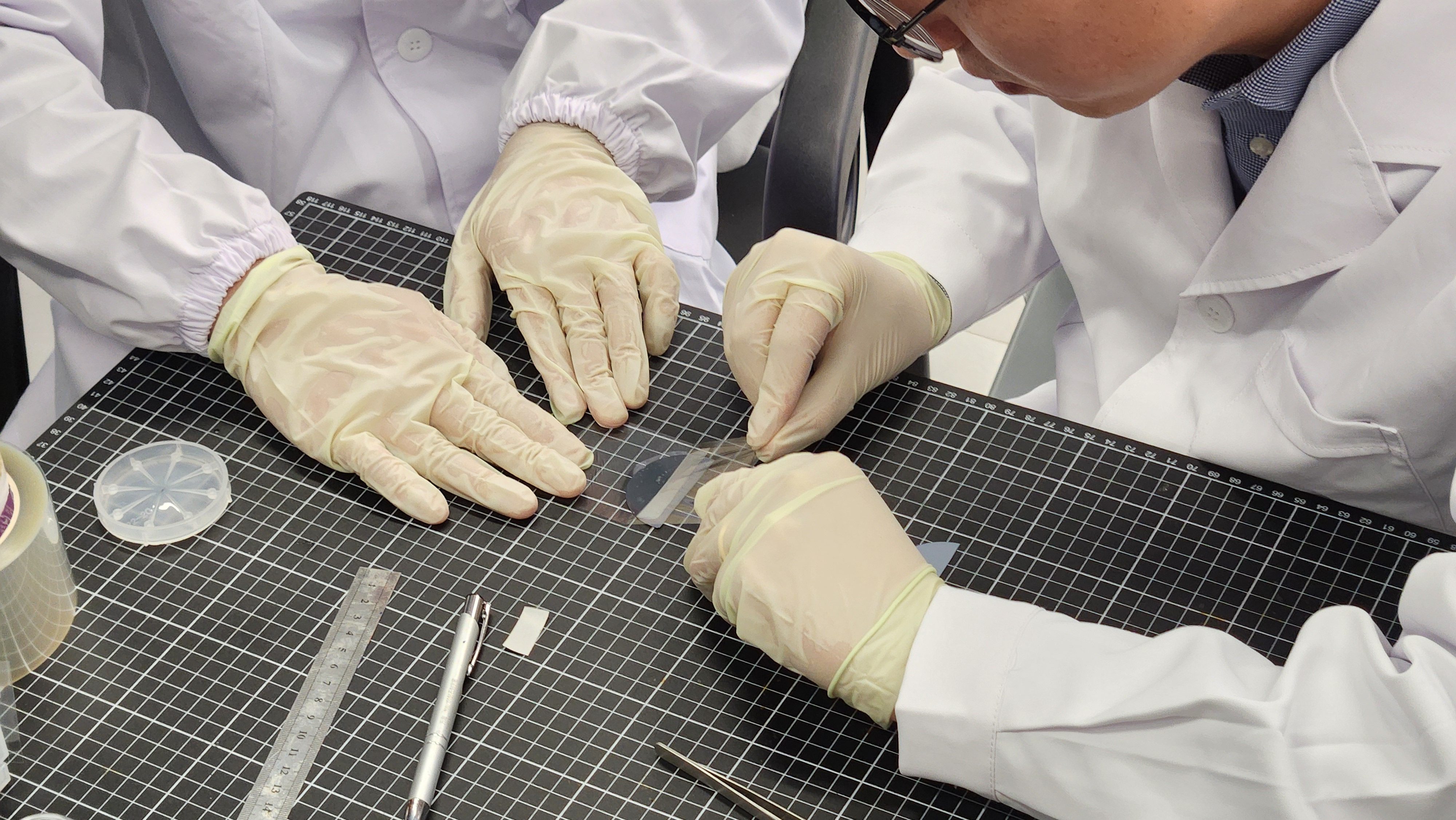 University of Hong Kong students work on a groundbreaking diamond membrane technology on December 19, paving the way for its mass production and widespread use in electronics. Photo: Holly Chik