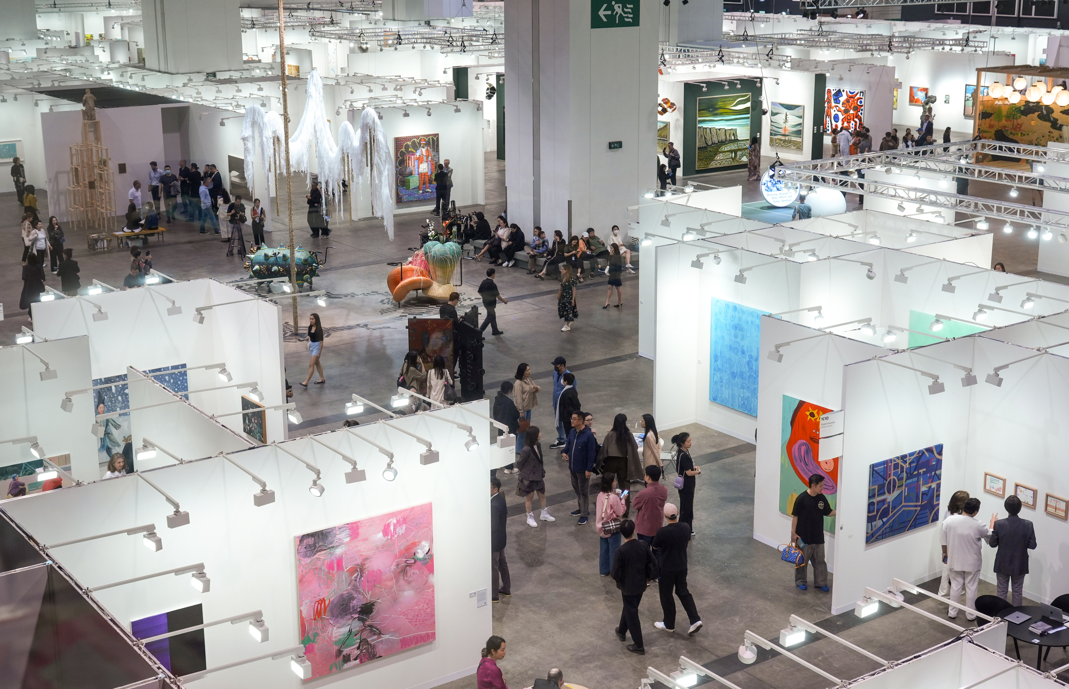 Visitors admire artworks at Art Basel Hong Kong 2024. Photo: SCMP / Eugene Lee
