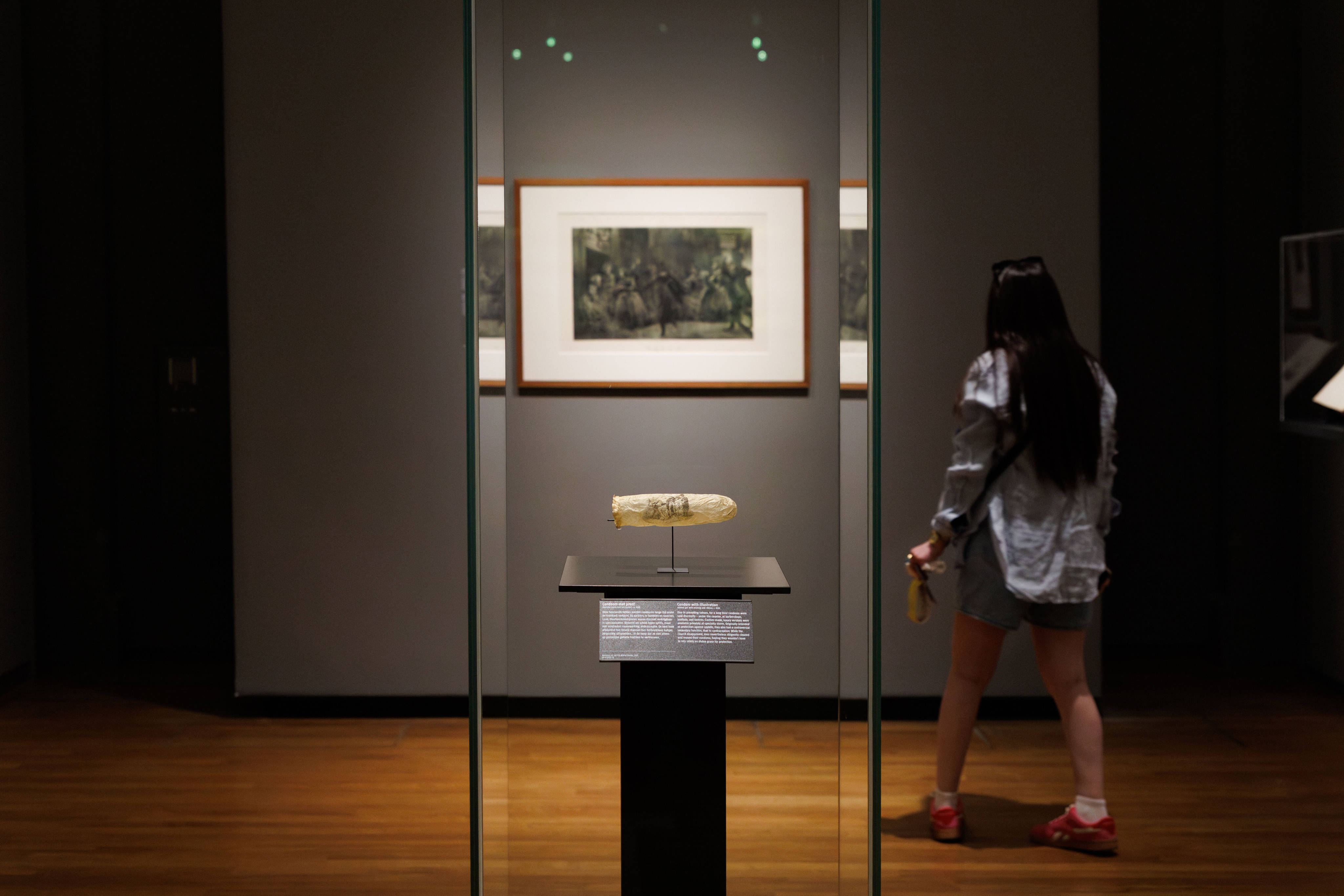 A condom made around 1830 and emblazoned with erotic art on display at Amsterdam’s Rijksmuseum. Photo: Rijksmuseum via AP