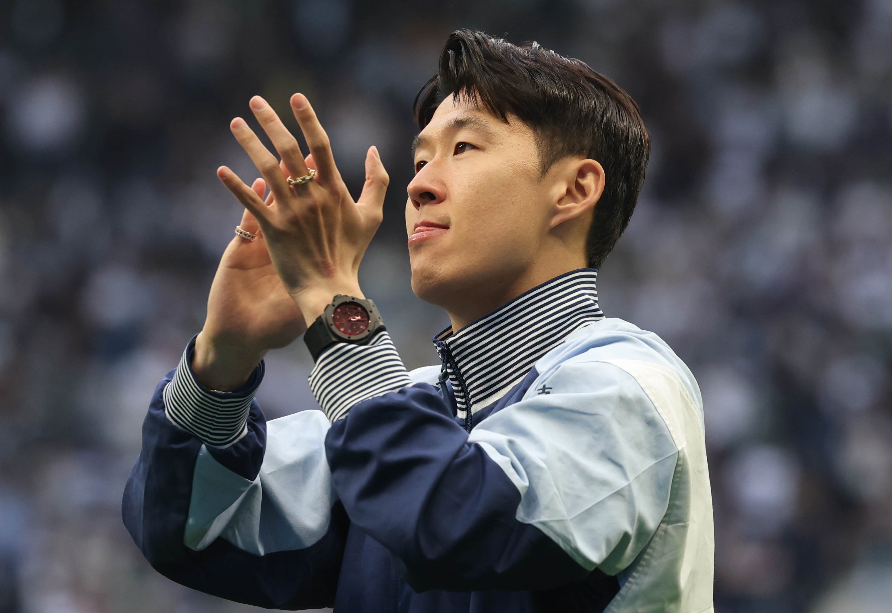 Son Heung-min applauds the Tottenham Hotspur fans during a lap of honour after their final Premier League match of the campaign. Photo: EPA