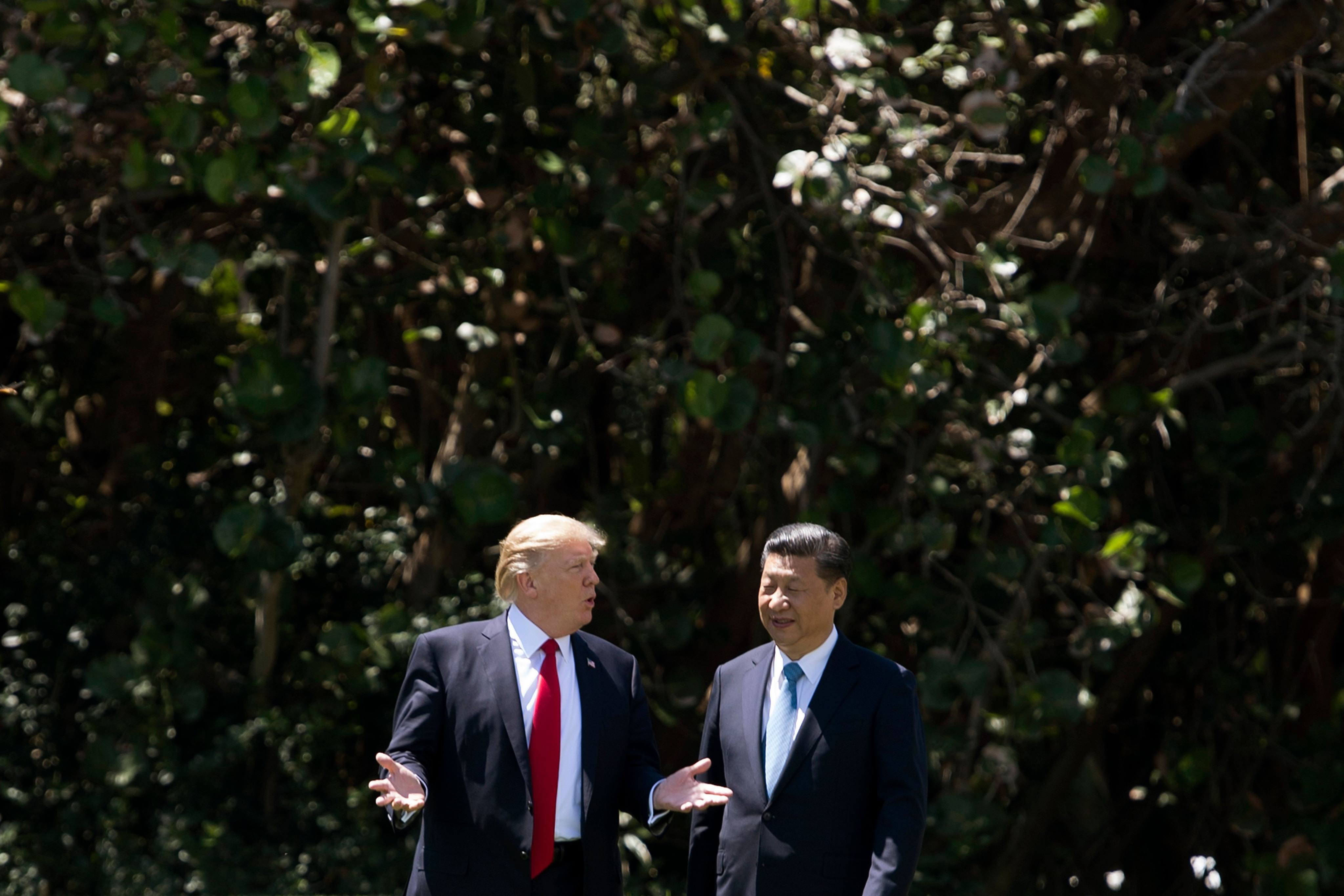 US President Donald Trump (left) and Chinese President Xi Jinping walk together at the Mar-a-Lago estate in West Palm Beach, Florida, on April 7, 2017. Relations between the two countries have soured during Trump’s second term in office. 
Photo: AFP