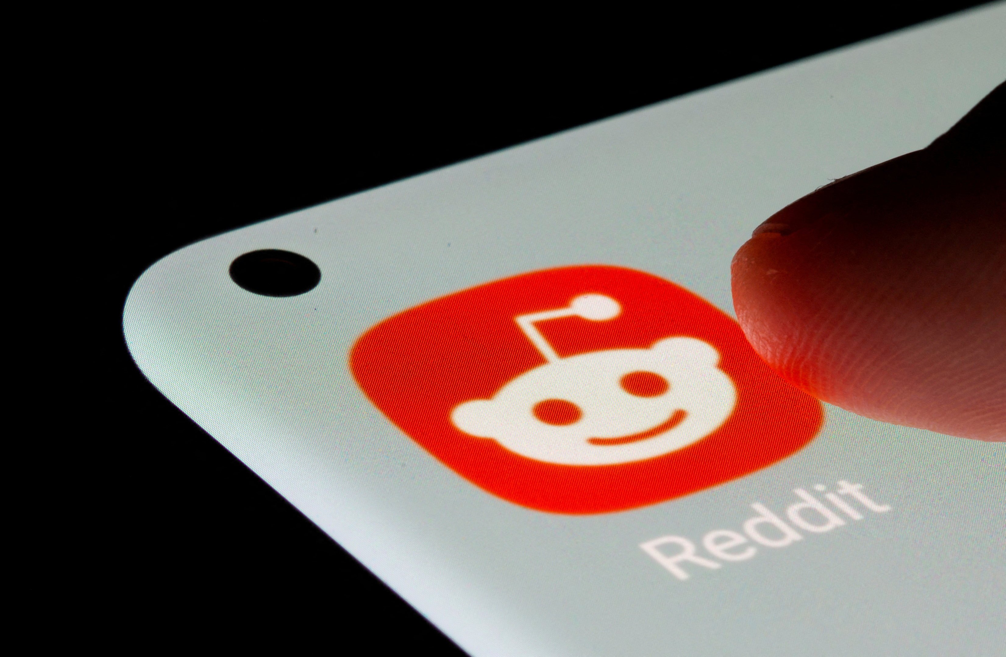 The Reddit app is seen on a smartphone in this illustration taken July 13, 2021. Photo: Reuters