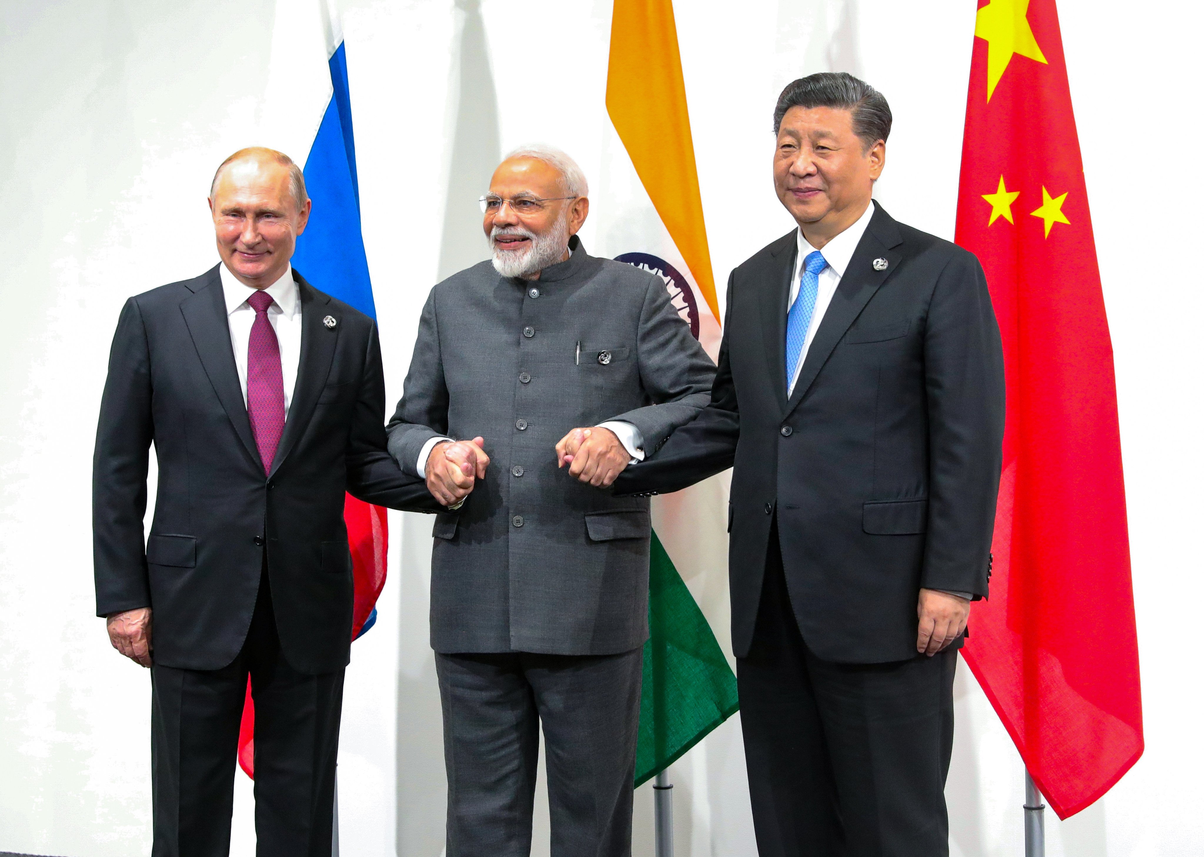 Russia’s President Vladimir Putin (left), India’s Prime Minister Narendra Modi and China’s President Xi Jinping met on the sidelines of the G20 summit in Osaka on June 28, 2019. Attempts to reform a triumvirate against the US-led West face obstacles within and outside the trio. Photo: Sputnik/Reuters