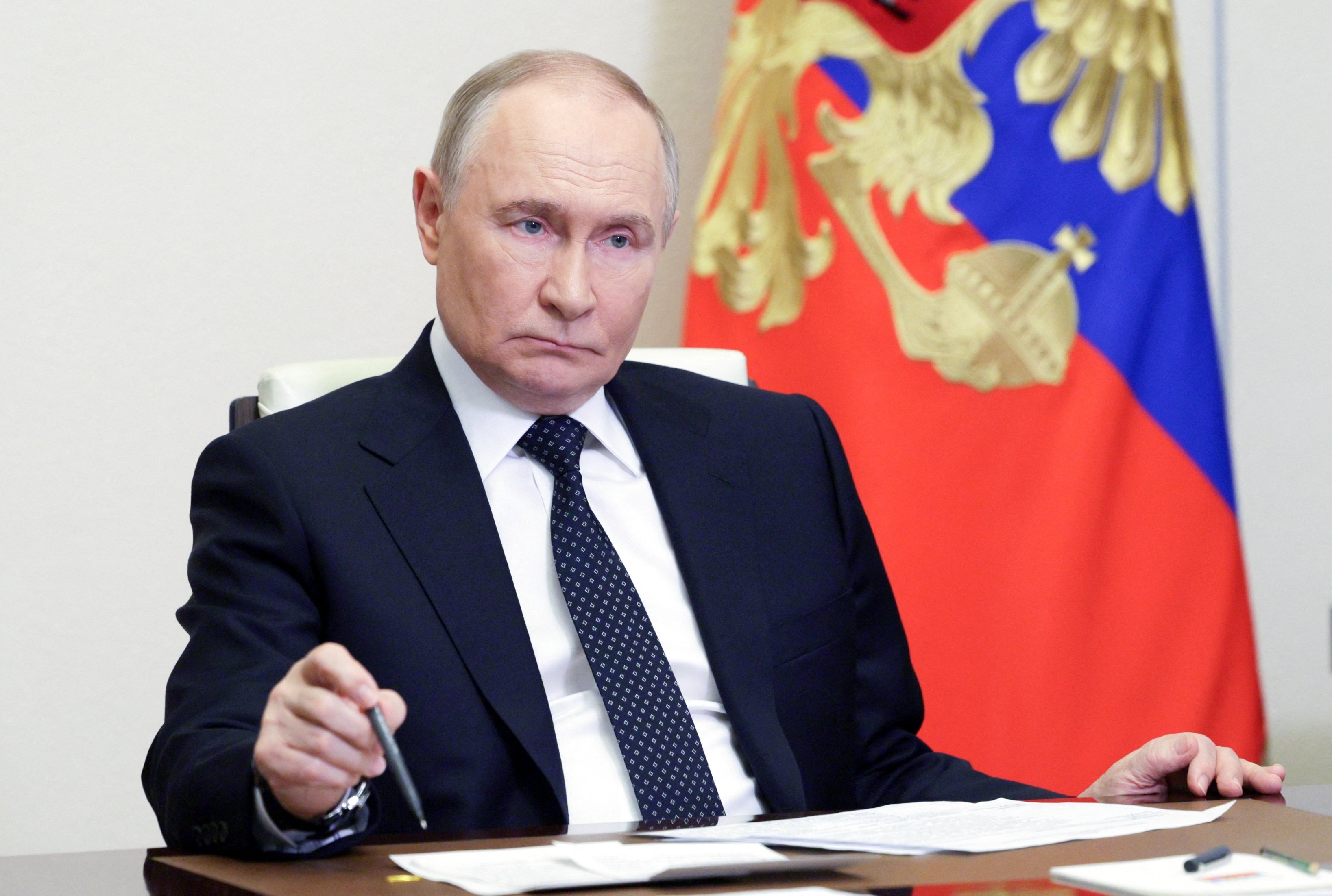 Russian President Vladimir Putin chairs a meeting at the Novo-Ogaryovo state residence outside Moscow on Wednesday. Photo: Sputnik via Reuters