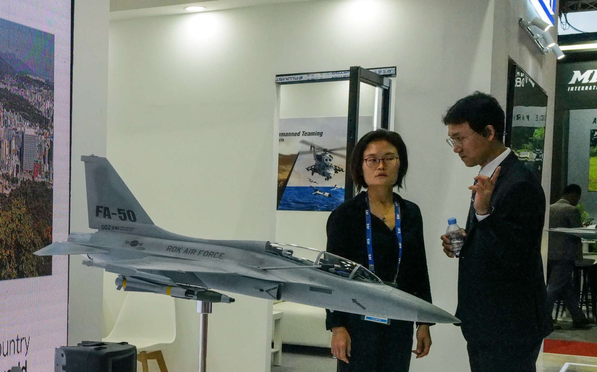 Representatives of Korea Aerospace Industries are seen during 5th edition of Asian Defence and Security Exhibition in September last year in Manila, showcasing the new FA-50s. Photo: Jeoffrey Maitem Representatives of Korea Aerospace Industries are seen during 5th edition of Asian Defence and Security Exhibition in September last year in Manila, showcasing the new FA-50s. Photo: Jeoffrey Maitem