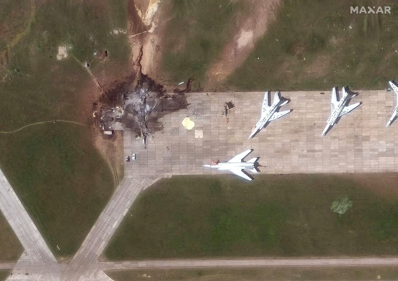 A satellite image shows a destroyed TU-22 aircraft in the aftermath of a drone strike at the Belaya air base, Irkutsk region, Russia. Photo: Maxar Technologies via Reuters