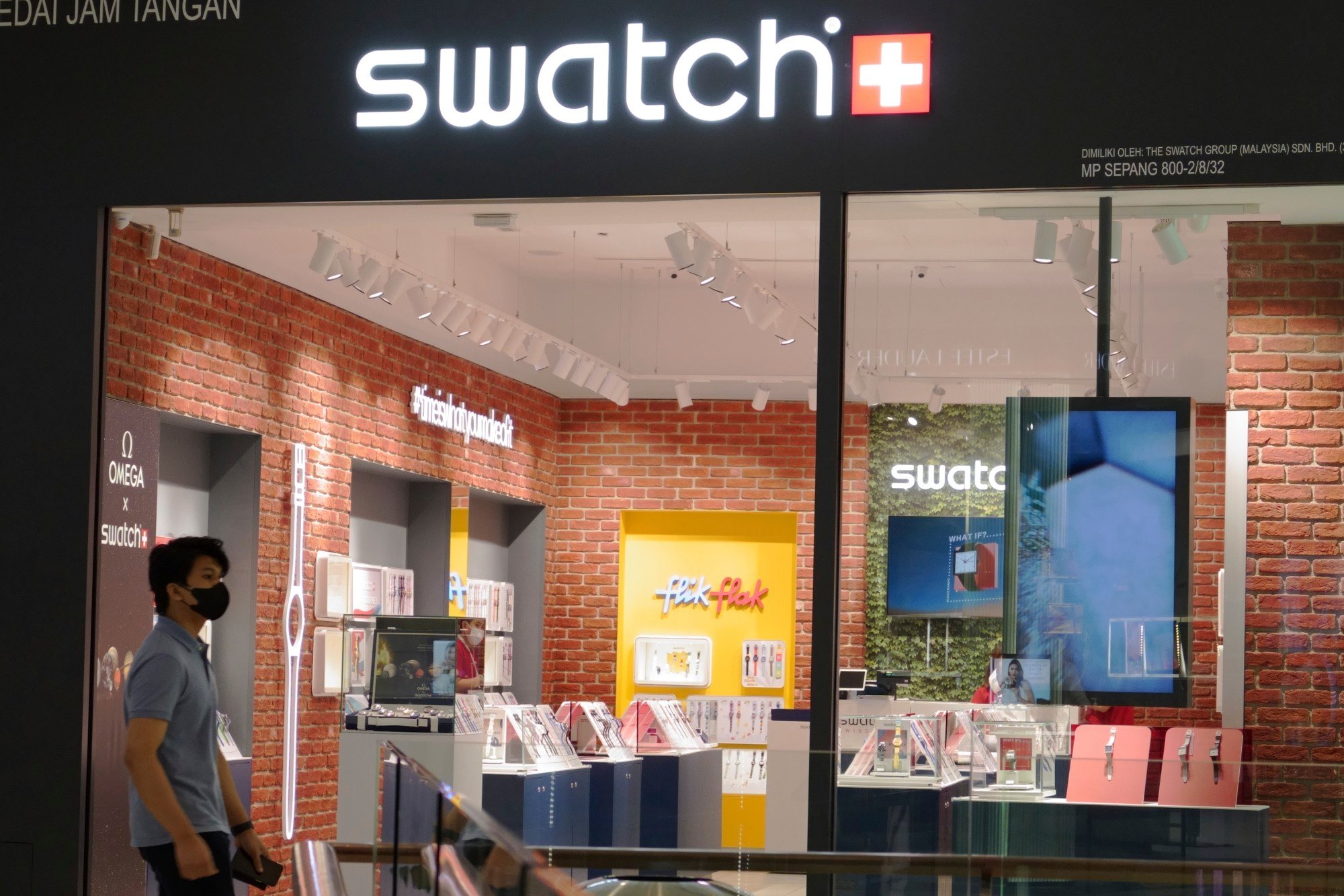 A man walks past a Swatch outlet at a shopping centre in Putrajaya. Malaysia’s government previously banned all Swatch products containing LGBTQ elements. Photo: AP A man walks past a Swatch outlet at a shopping centre in Putrajaya. Malaysia’s government previously banned all Swatch products containing LGBTQ elements. Photo: AP