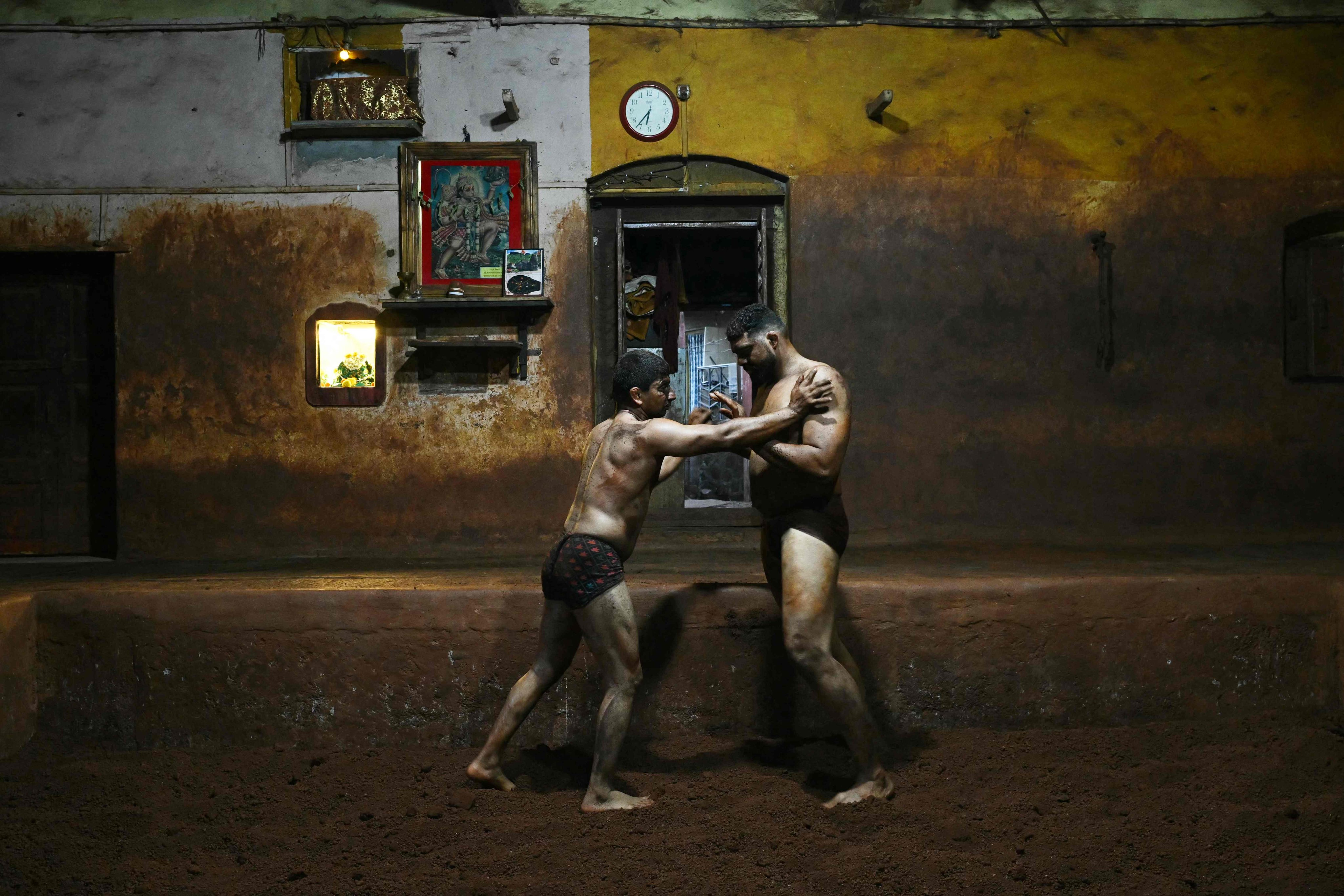 Mud wrestling, also known as “kushti”, is a traditional Indian sport that combines ancient combat techniques with Persian martial arts. Photo: AFP