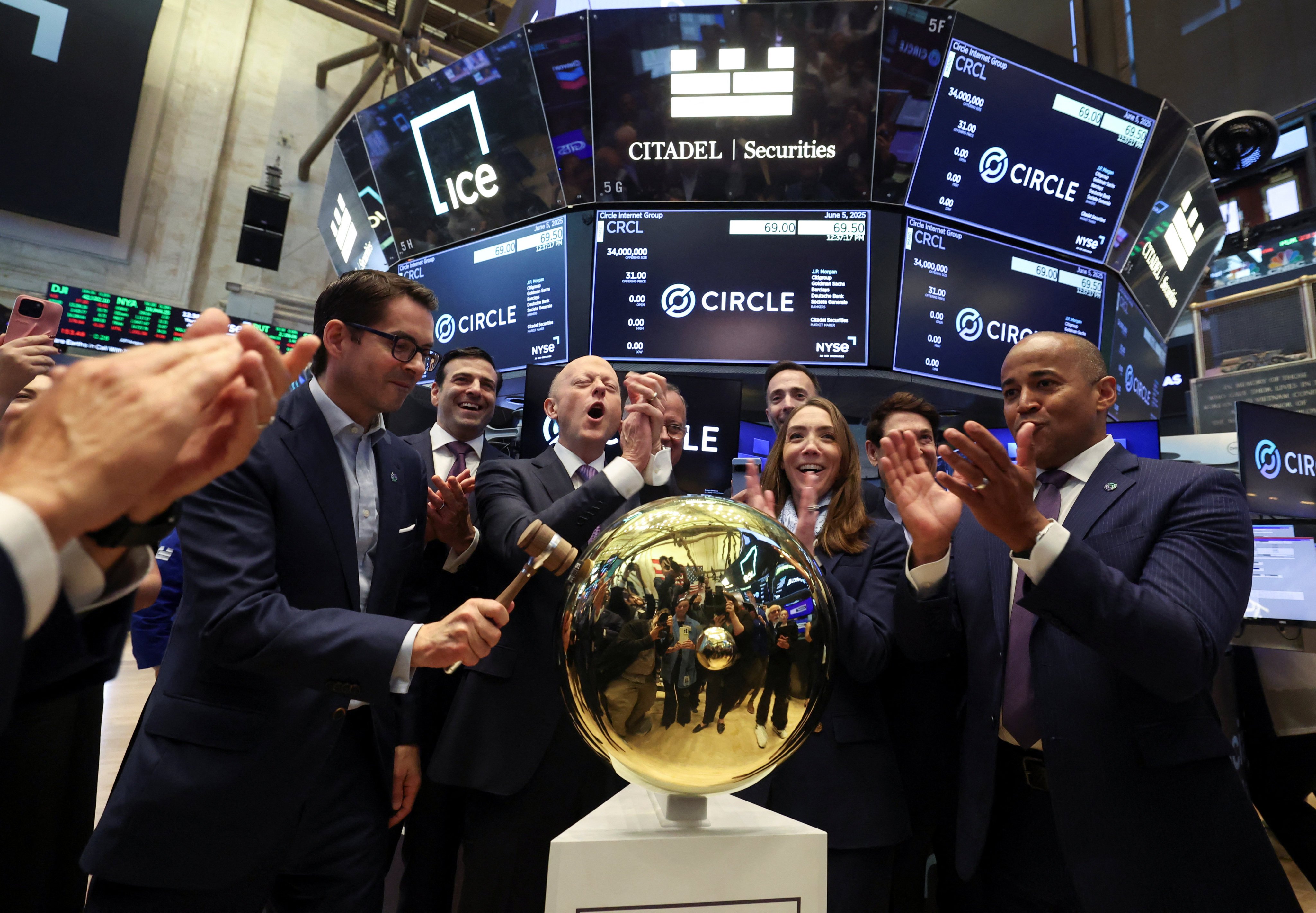 Jeremy Allaire, CEO and co-founder of Circle Internet Group reacts as Circle president Heath Tarbert rings a ceremonial bell to launch the company’s IPO at the New York Stock Exchange on Thursday. Photo: Reuters