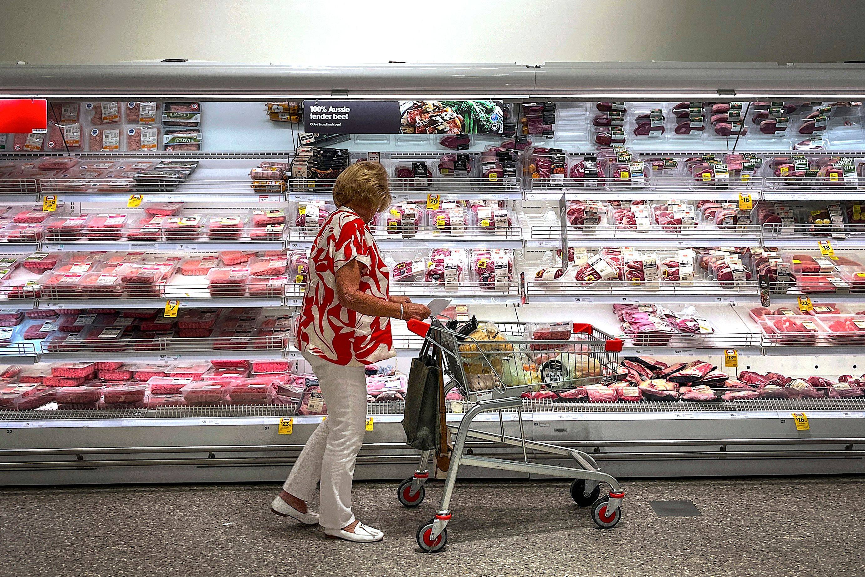 A shopper looks at Australian beef products for sale at a supermarket in Sydney. Photo: AFP