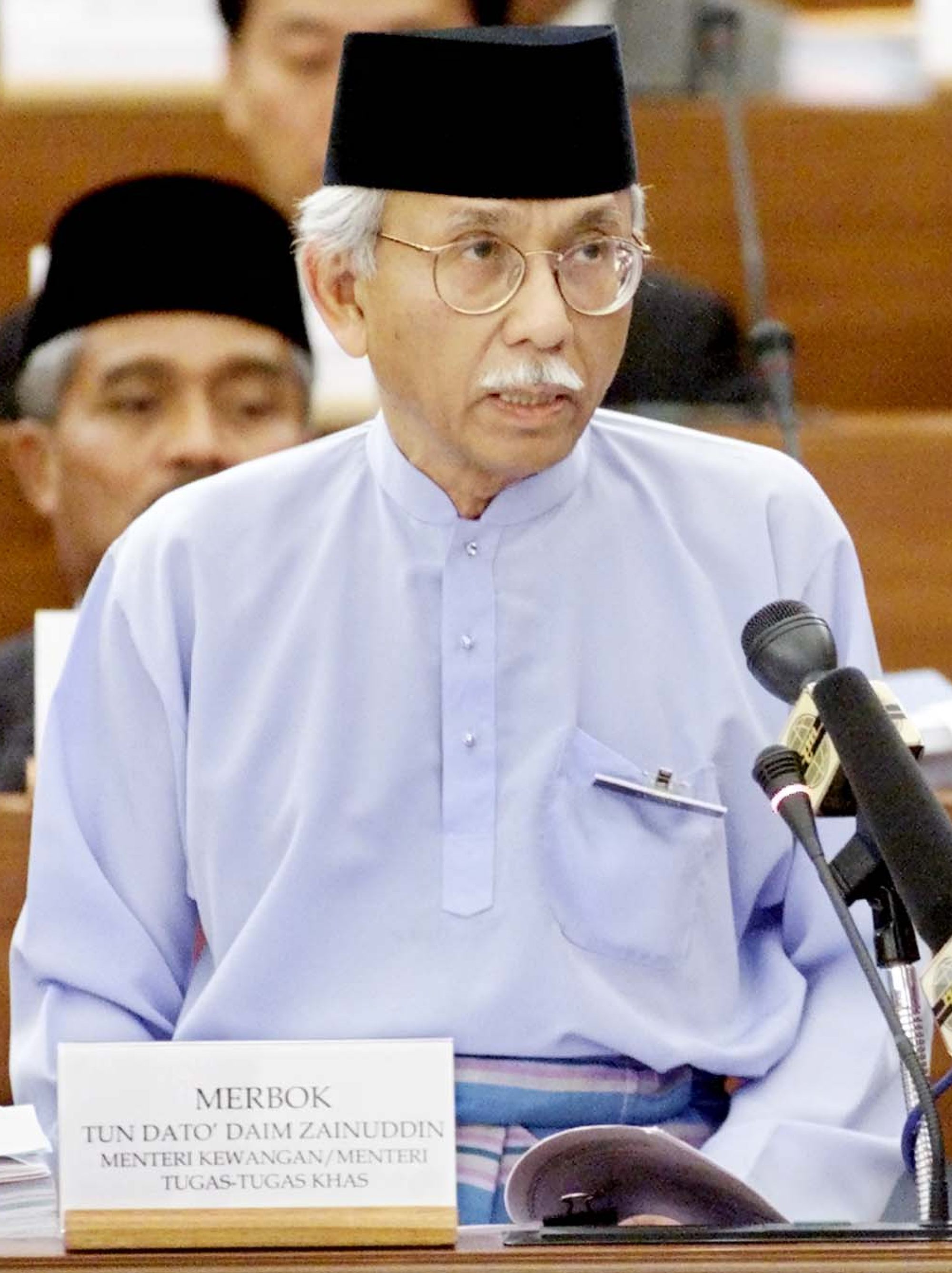 Daim Zainuddin reads his 2001 budget speech as finance minister. Photo: AFP Daim Zainuddin reads his 2001 budget speech as finance minister. Photo: AFP