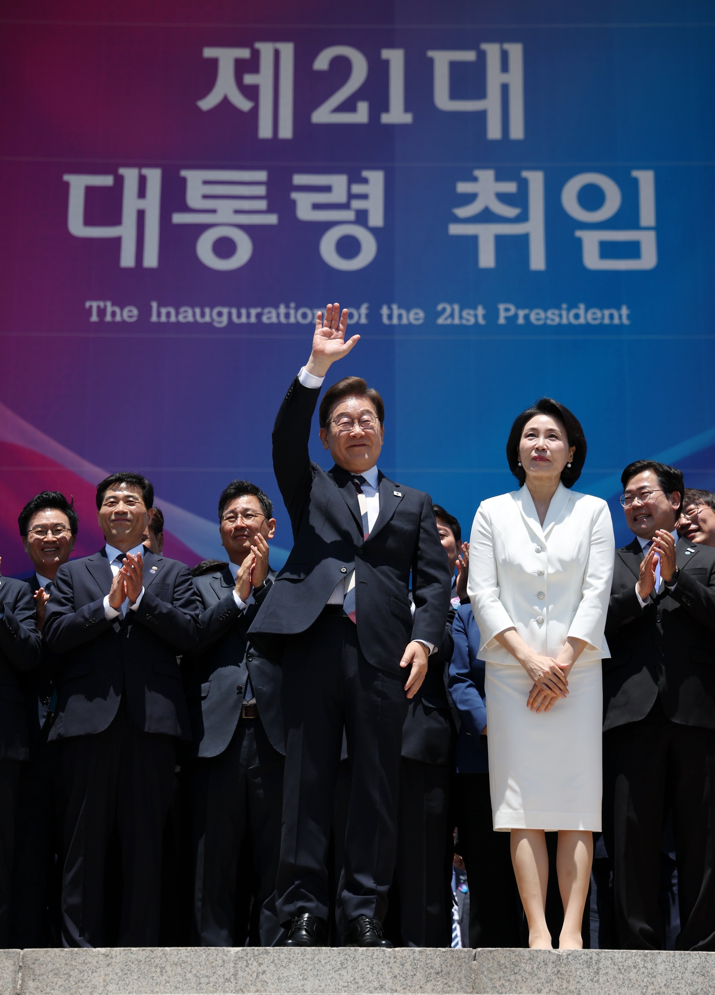South Korean President Lee Jae-myung, standing alongside his wife, Kim Hye-kyung, waves after attending his inauguration ceremony in Seoul on June 4. Lee and his progressive Democratic Party are largely regarded as more friendly towards China and North Korea. Photo: EPA-EFE