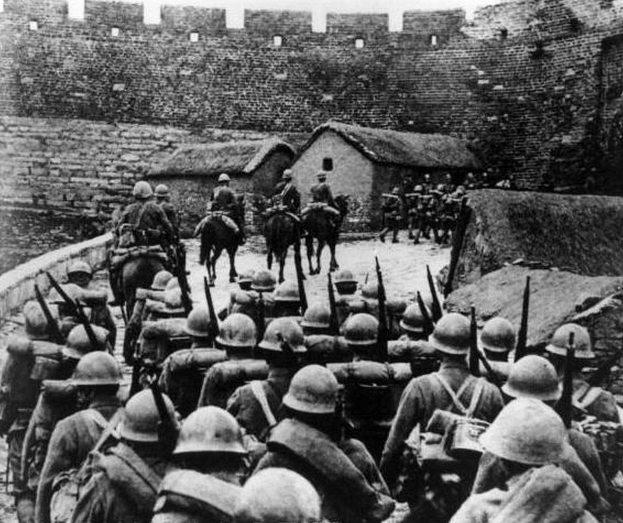 Japanese soldiers enter a city in China during the invasion of North East China in the Second Sino-Japanese War. Photo: Universal History Archive/Getty Japanese soldiers enter a city in China during the invasion of North East China in the Second Sino-Japanese War. Photo: Universal History Archive/Getty