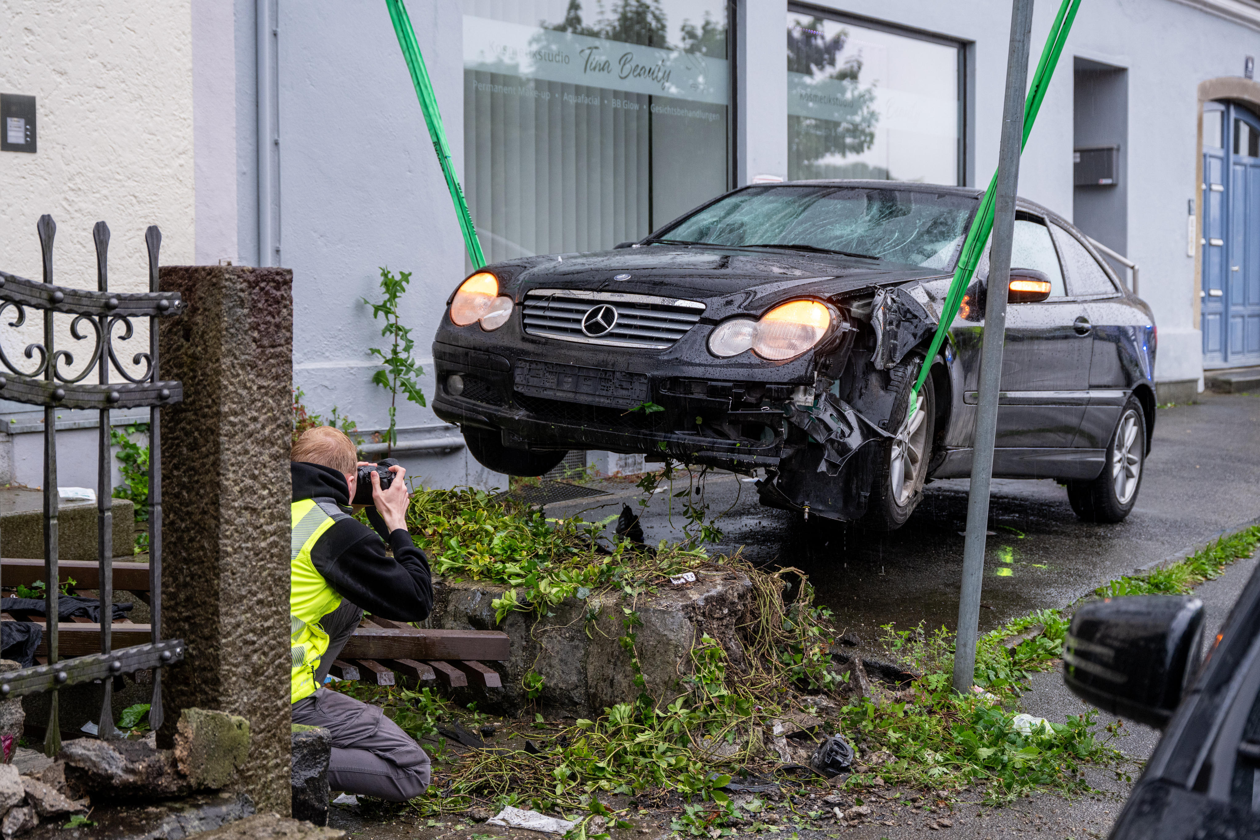 A damaged car is photographed after a man drove into a group of people in Passau, Germany, on Saturday. Photo: dpa