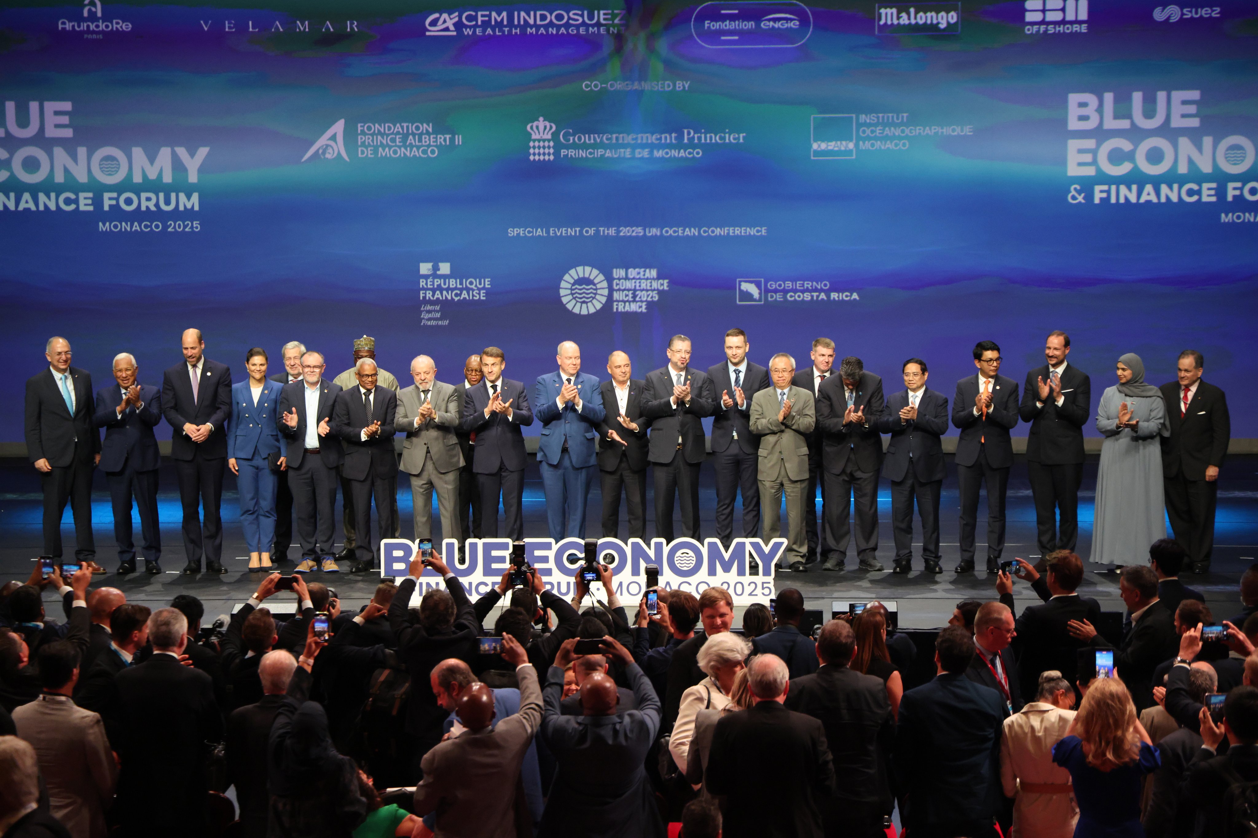 UNOC participants, including France’s President Emmanuel Macron (centre-left) and Prince Albert II of Monaco (centre-right) on stage at the end of the Blue Economy and Finance Forum (BEFF) at the Grimaldi Forum in Monaco on Sunday. Photo: EPA-EFE