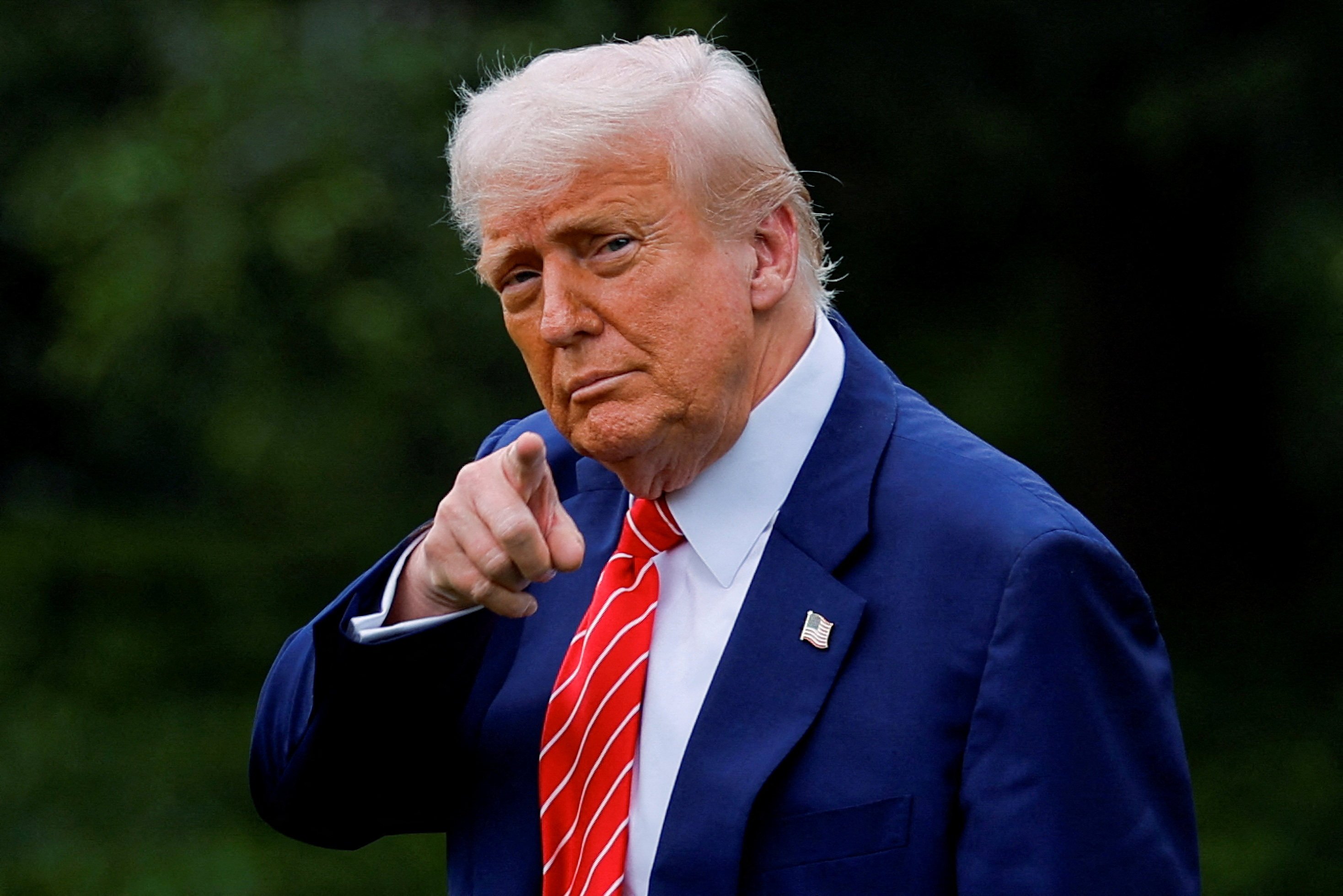 US President Donald Trump gestures on the South Lawn of the White House in May. Photo: Reuters
