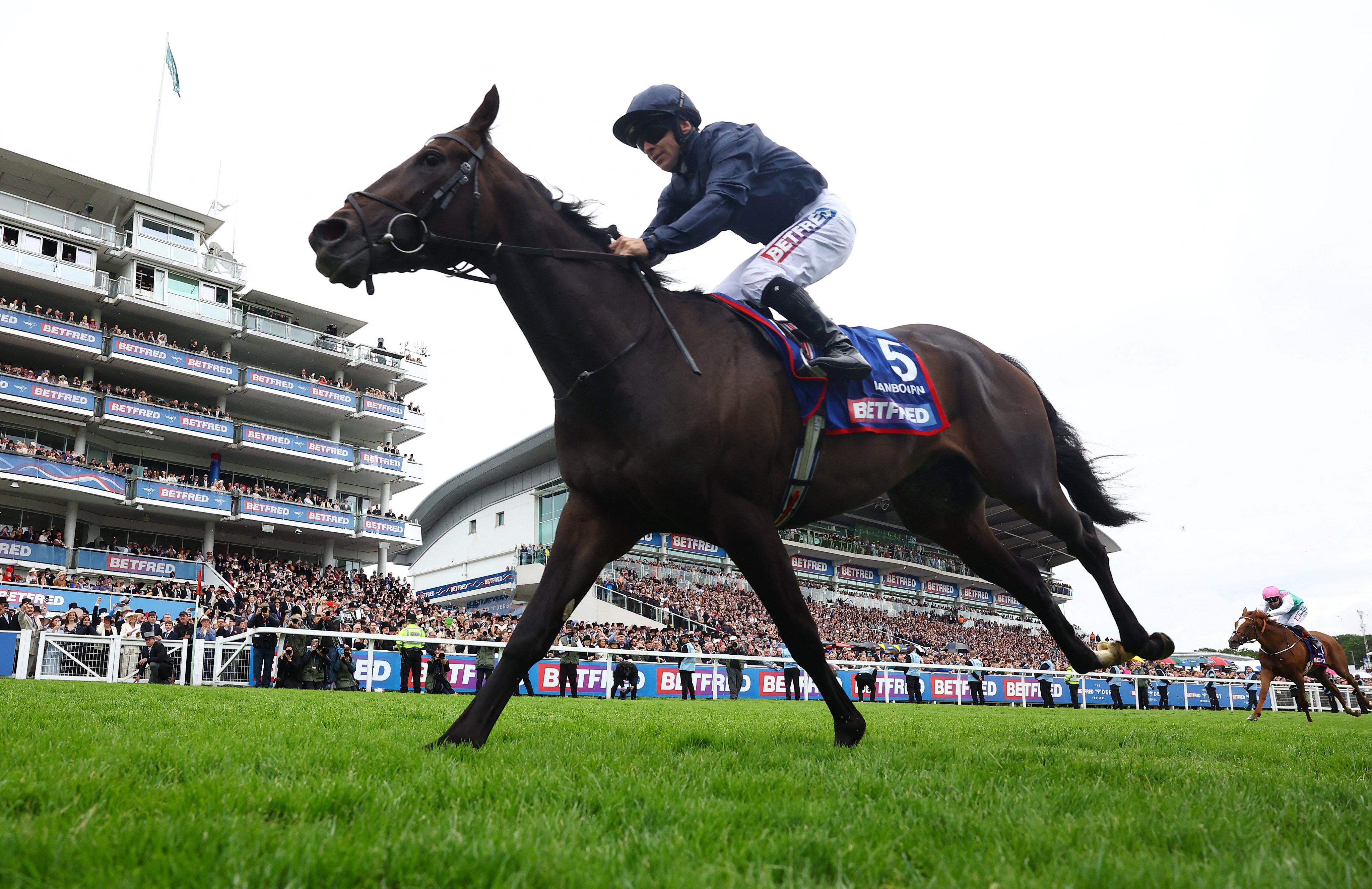 Lambourn wins the Epsom Derby under Wayne Lordan. Photo: Reuters