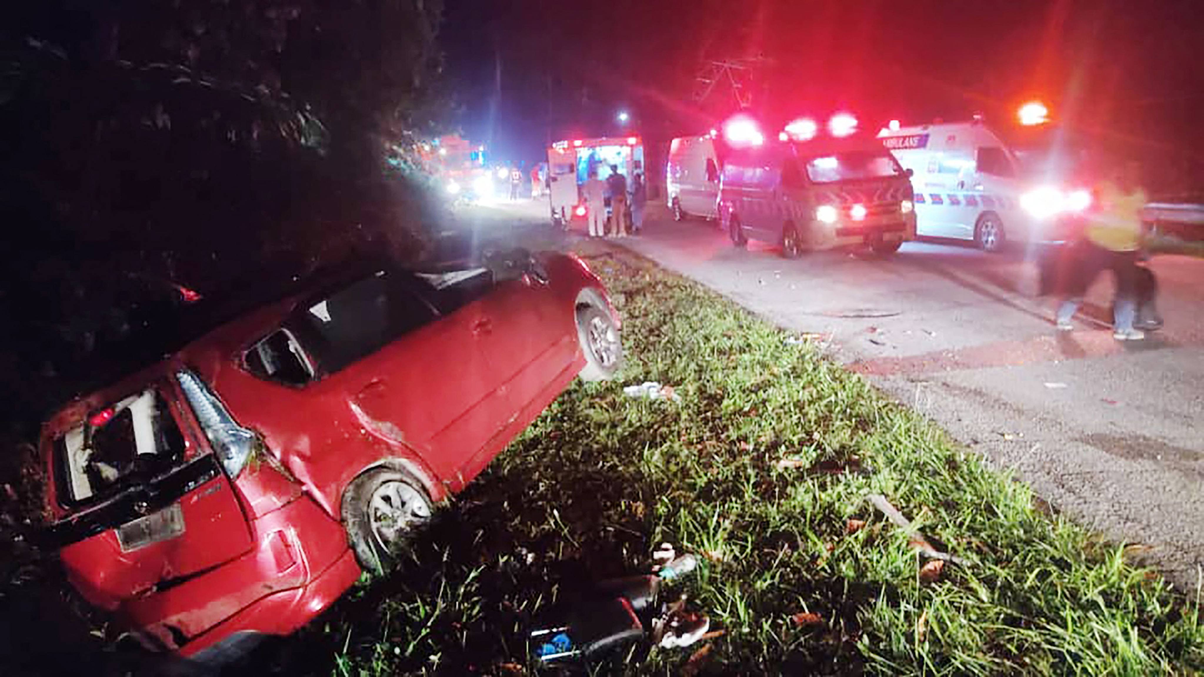 A minivan is seen after it collided with a bus in Gerik-Jeli, in Malaysia’s Perak state. Photo: Perak Fire and Rescue Department/AFP