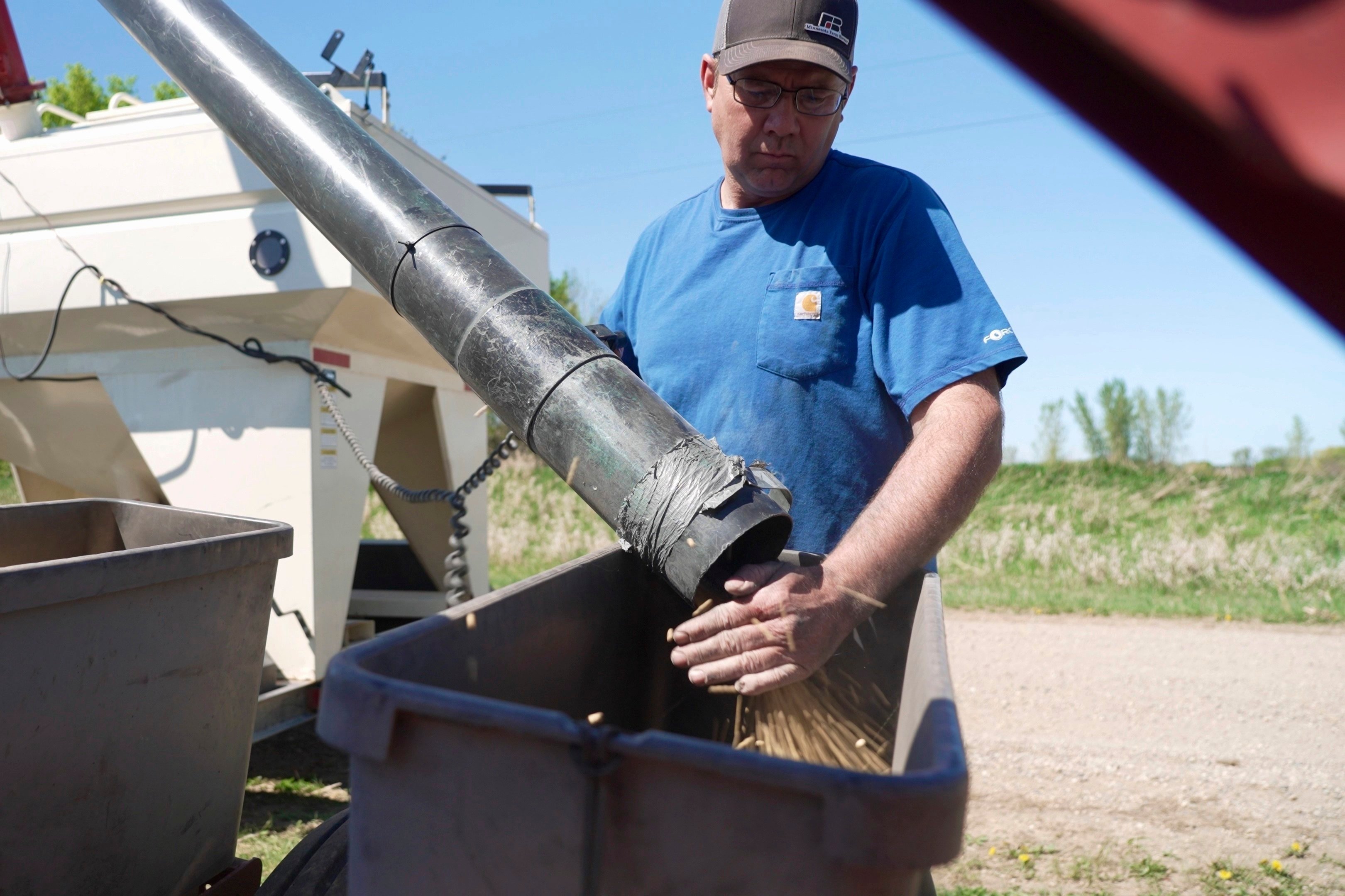 Minnesota Farm Bureau president Dan Glessing loads soybeans into his planter on May 8, 2025, near Waverly, Minnesota, US. Photo: AP