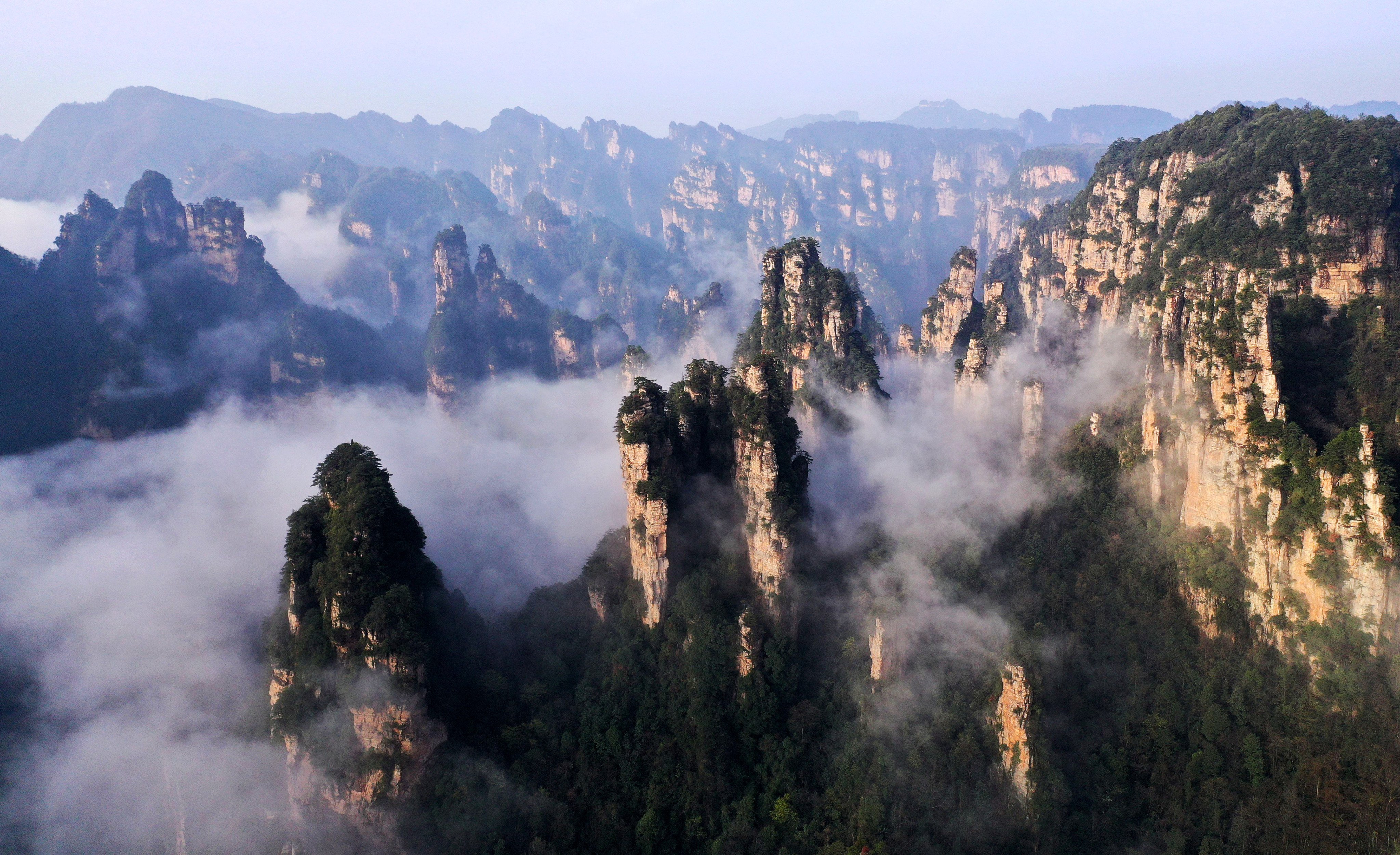 The discovery of mountains of rubbish in Zhangjiajie National Forest Park in China’s central Hunan province has prompted officials to investigate officials and launch protocols to clean the refuse out of ancient caves. Photo: Xinhua