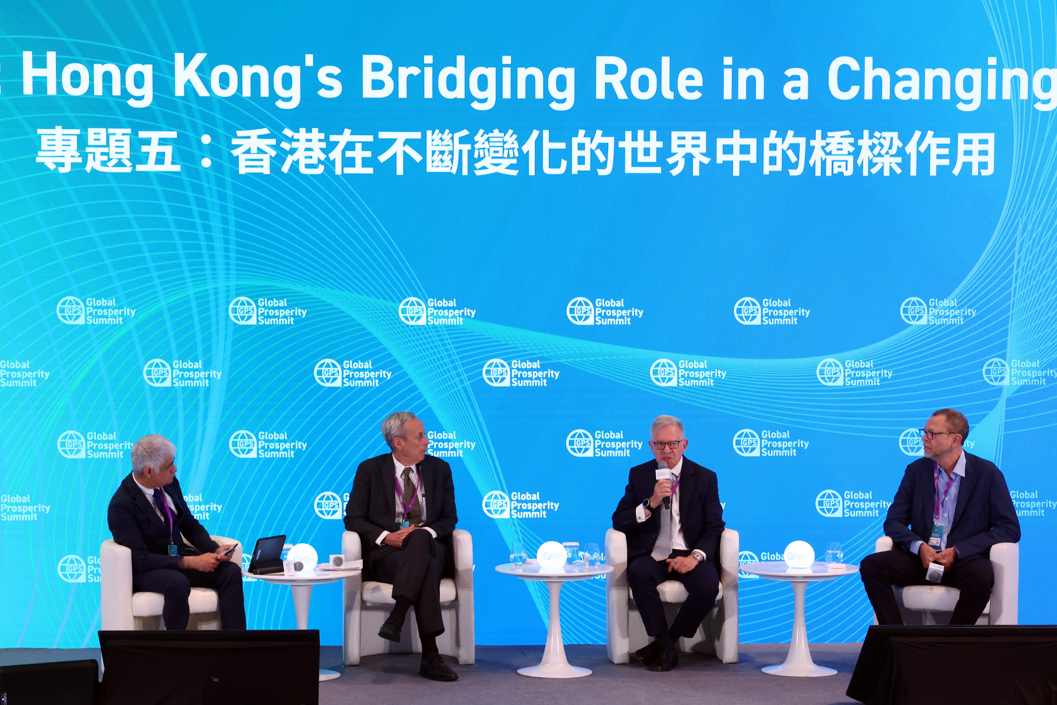 (From left) Vikram Channa, vice-president and head of content and products, Greater China and Southeast Asia, at Warner Bros Discovery, Craig Allen, former president of the US-China Business Council and senior counsellor at The Cohen Group, Sherard Cowper-Coles, chairman of the China-Britain Business Council and senior adviser to the group for HSBC Holdings, and Howard French, professor of journalism at the Columbia Journalism School of Columbia University, offer insights at a panel discussion of the Global Prosperity Summit 2025.