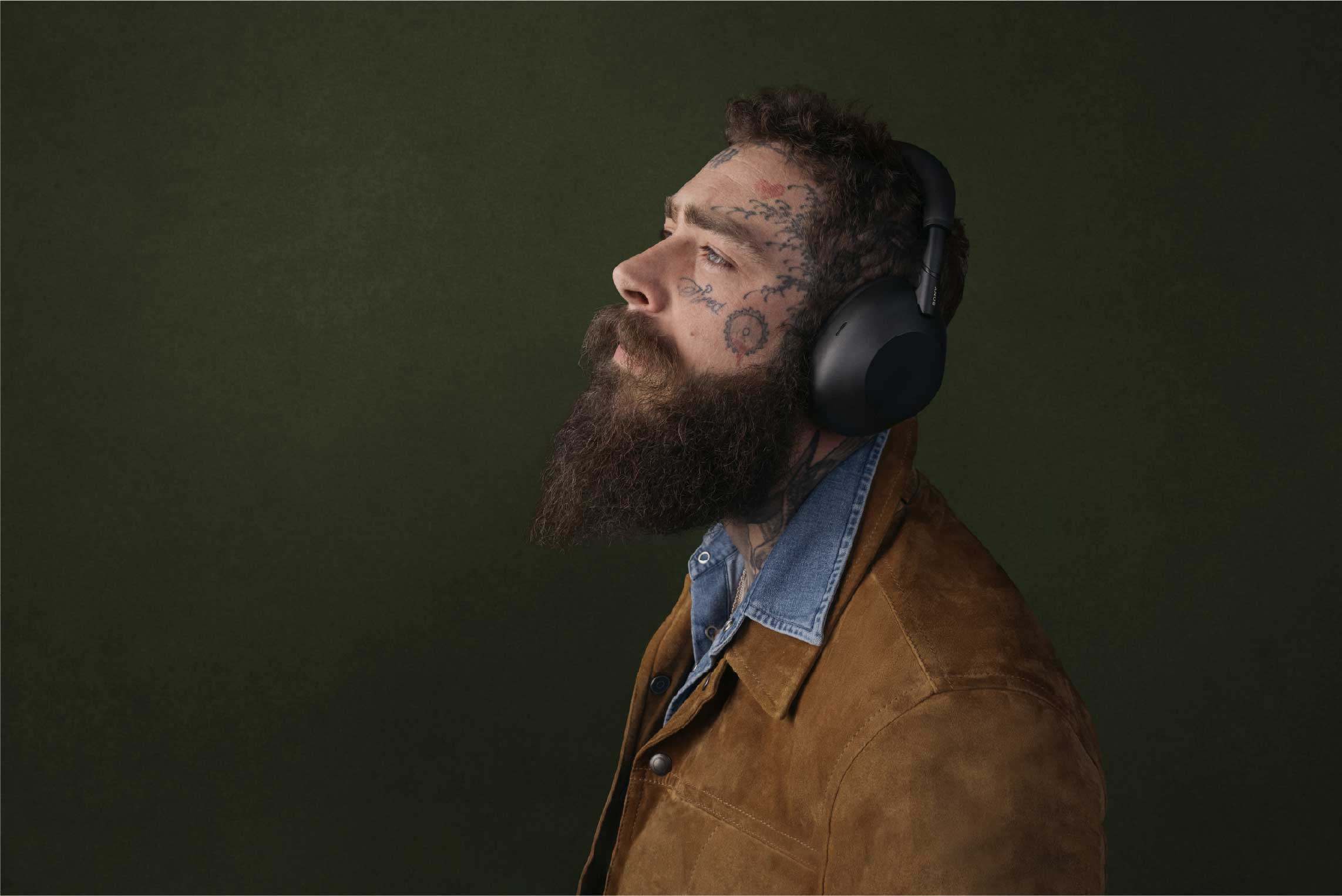 Promotional photo of the Sony WH-1000XM6 headphones, featuring American singer-songwriter Post Malone