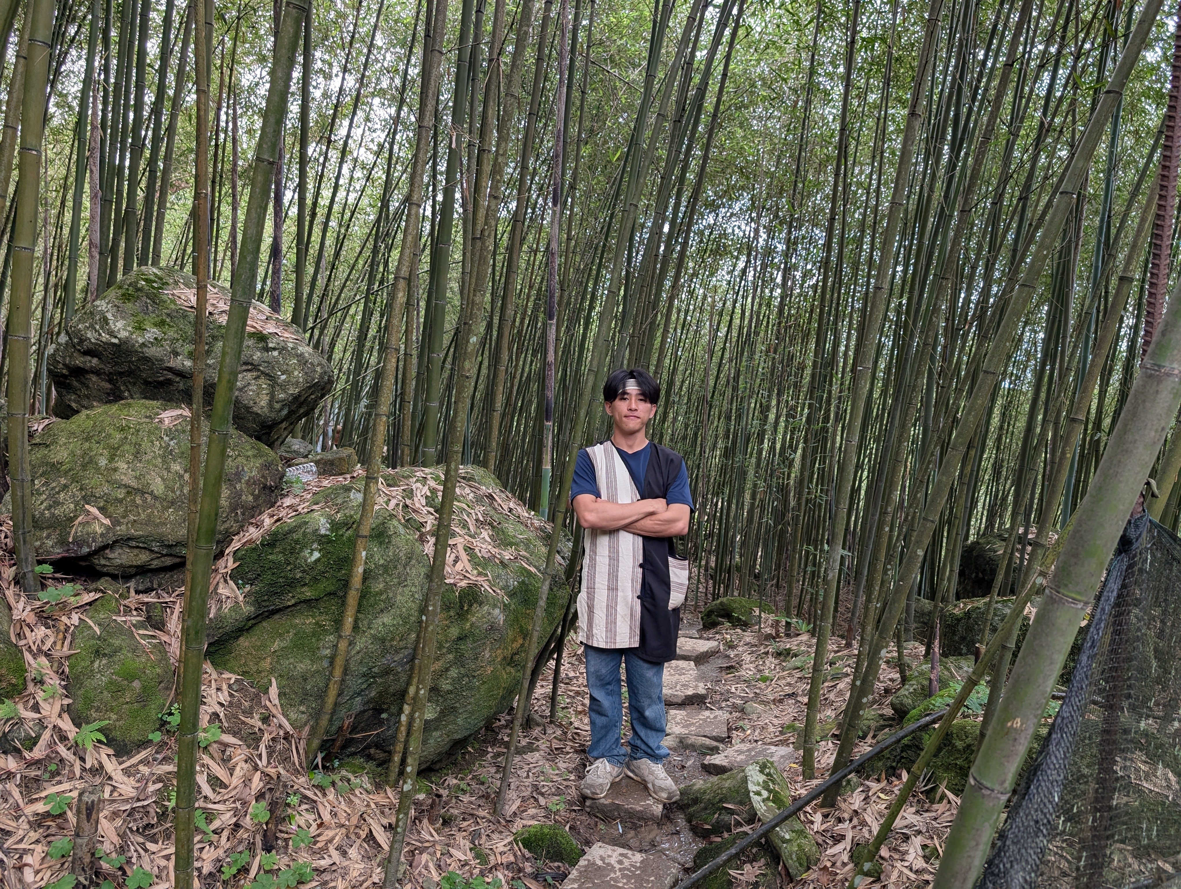 Dai Xinzhe, known by his Truku tribal name Doubi, in a bamboo forest in eastern Taiwan his ancestors once called home. He leads tours that showcase the culture and heritage of the aboriginal tribe. Photo: Lisa Cam