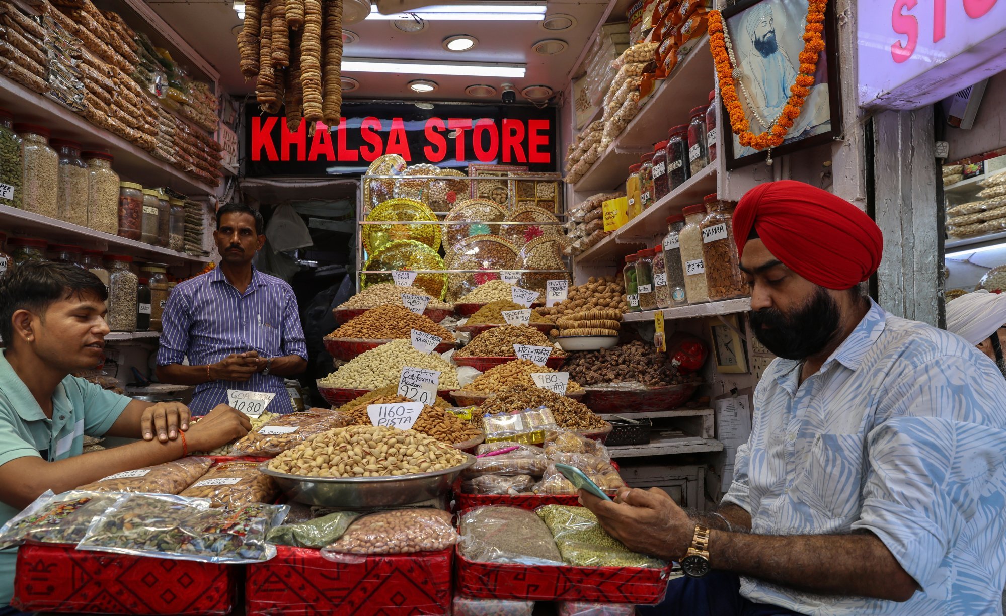 Food items on display for sale at a shop in a wholesale market in New Delhi on May 26. India is set to overtake Japan as the world’s fourth-largest economy by the end of this calendar year. Photo: EPA-EFE Food items on display for sale at a shop in a wholesale market in New Delhi on May 26. India is set to overtake Japan as the world’s fourth-largest economy by the end of this calendar year. Photo: EPA-EFE