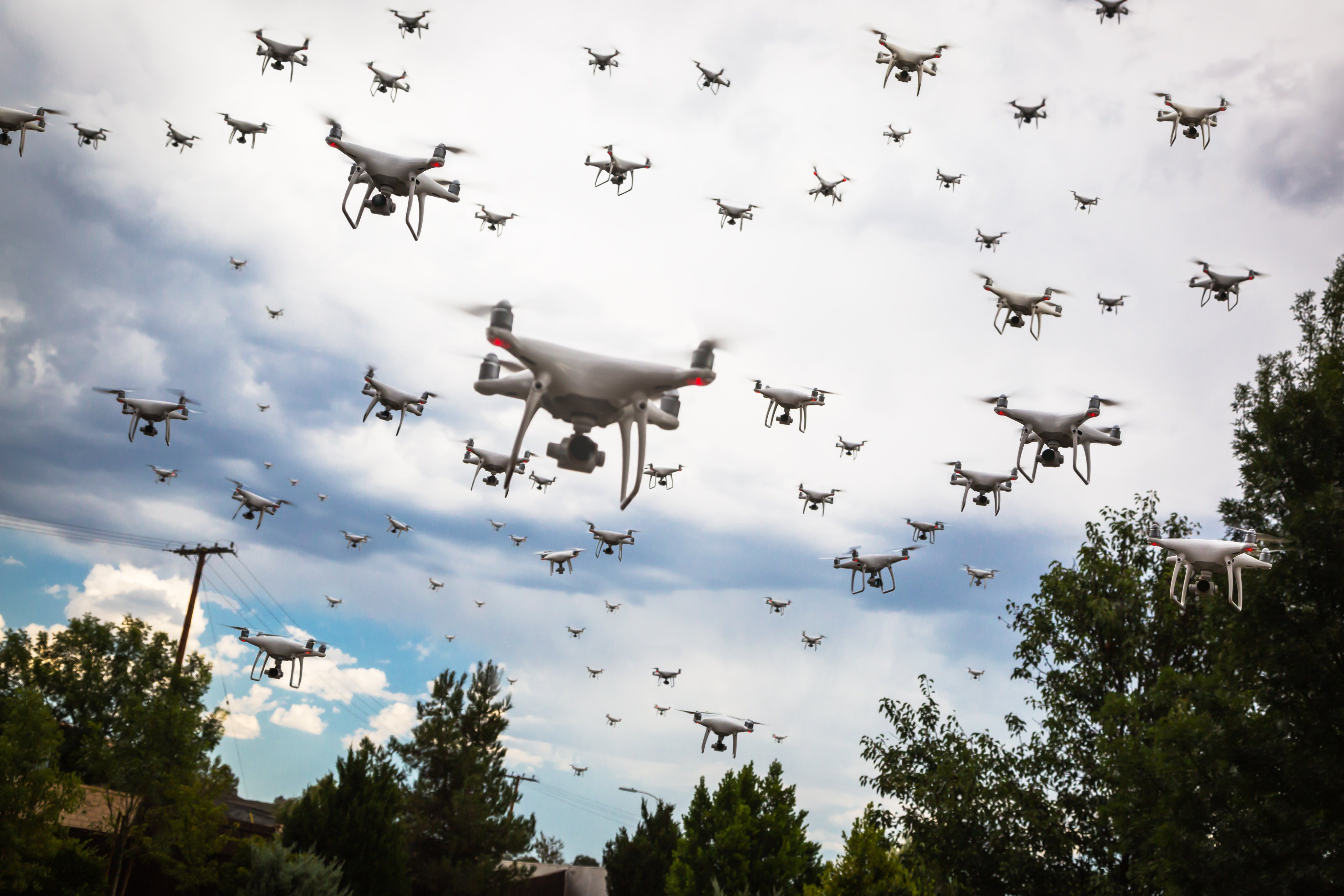 Dozens of drones swarm the sky. Pattaya authorities are planning to deploy drones to fight crime in the city. Photo:  Shutterstock