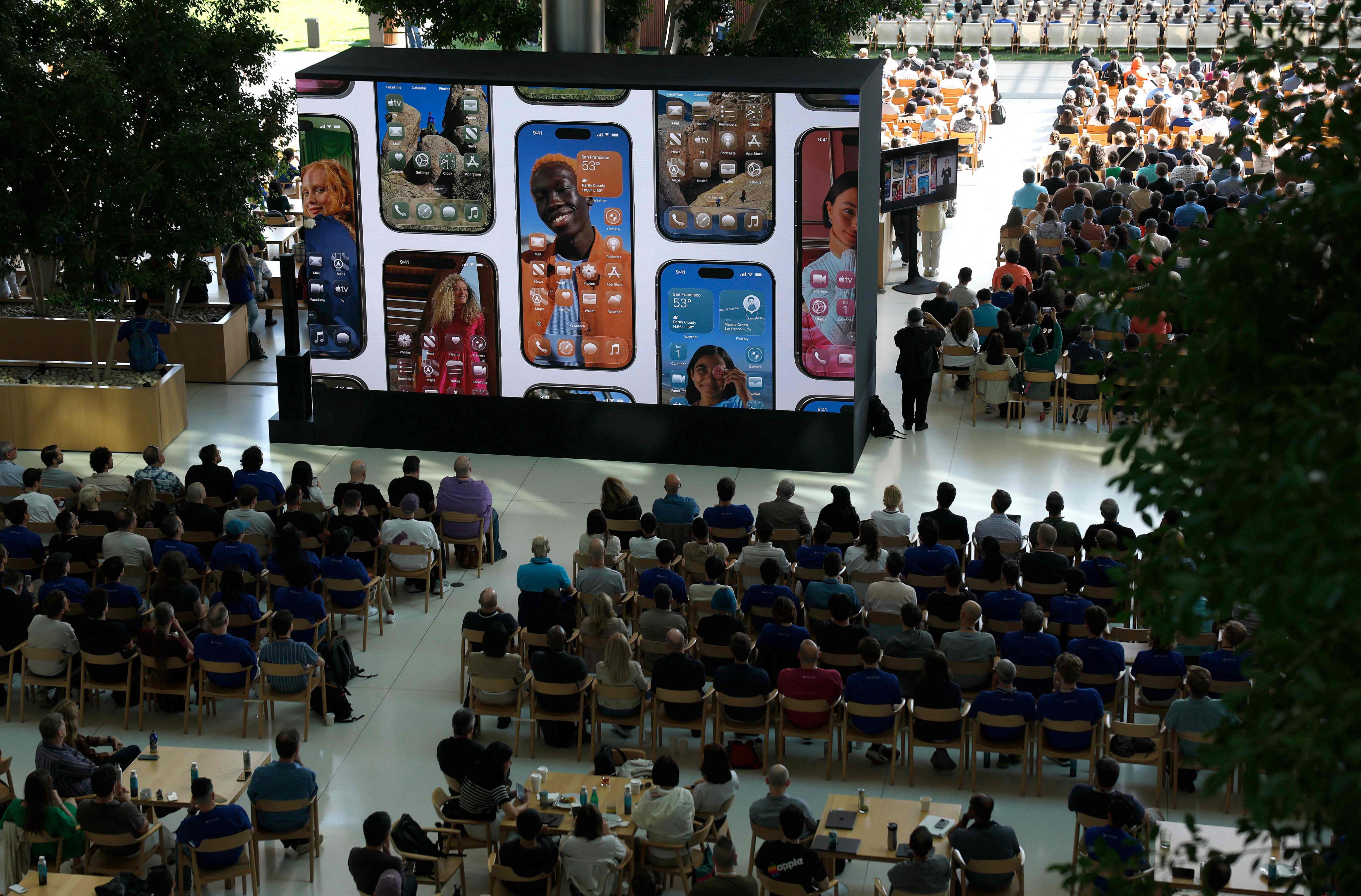 Apple previews a new software interface design at its annual Worldwide Developers Conference in Cupertino, California, on June 9, 2025. Photo: Getty Images via AFP