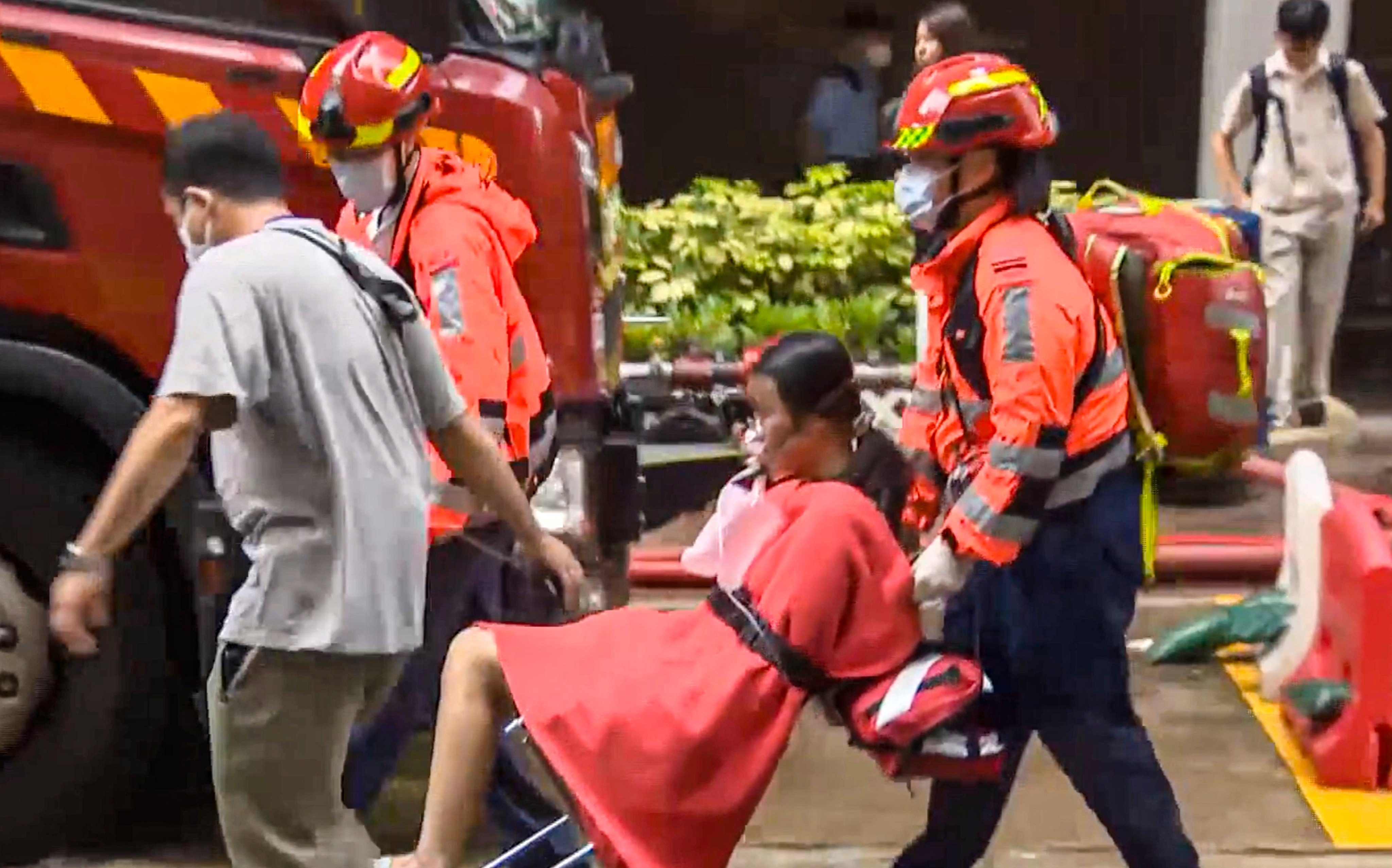 Hong Kong firefighters rescued a 17-year-old girl from a fire on Wednesday. Photo: Cable TV News