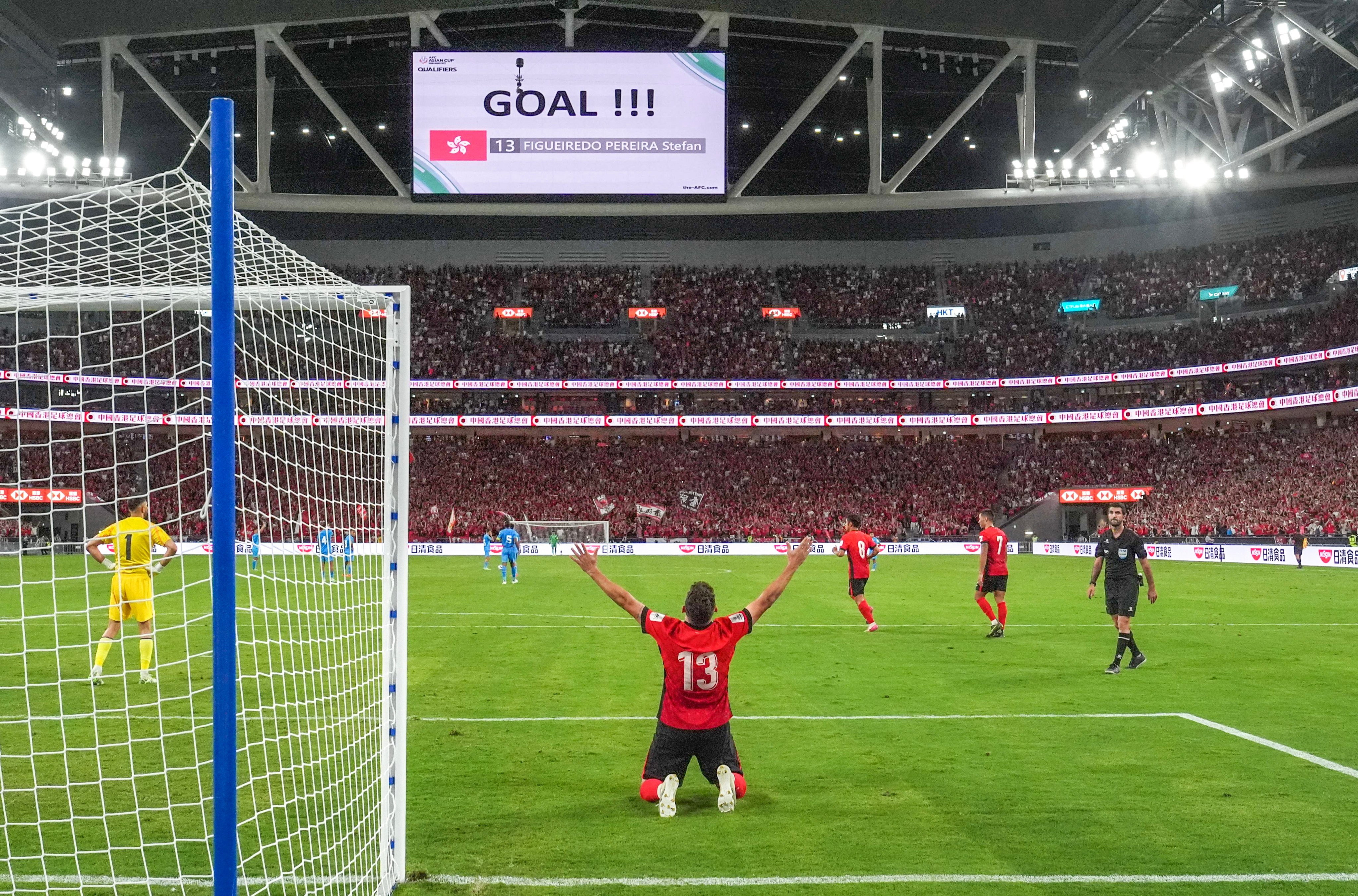Hong Kong’s Stefan Pereira (No 13) celebrates his winning goal against India at Kai Tak Stadium. Photo: Elson Li